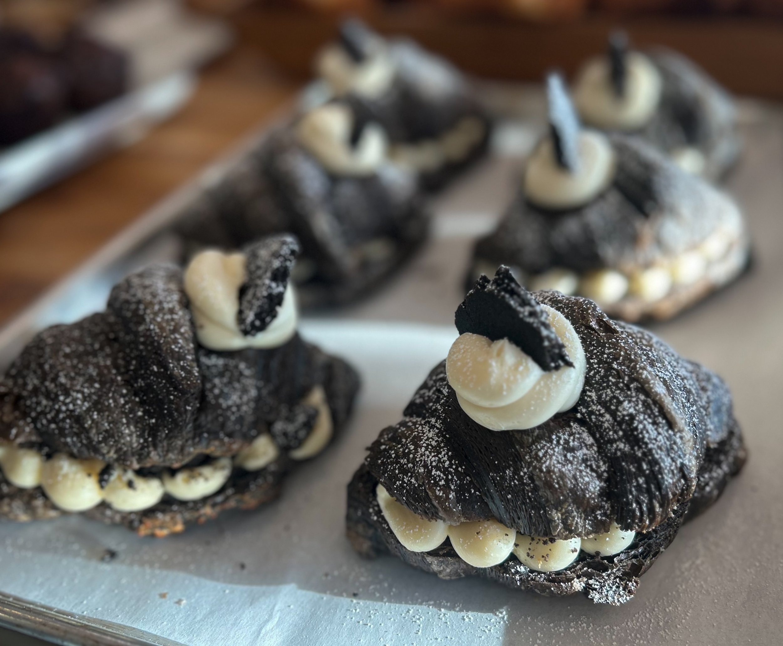 Rain is falling but our Cookies and Cream croissant is calling! On the counter til Sunday, then everyday til Halloween starting on the 13th!

Keep an eye out for some more spooky additions to our Fall lineup coming this week! 👻🎃