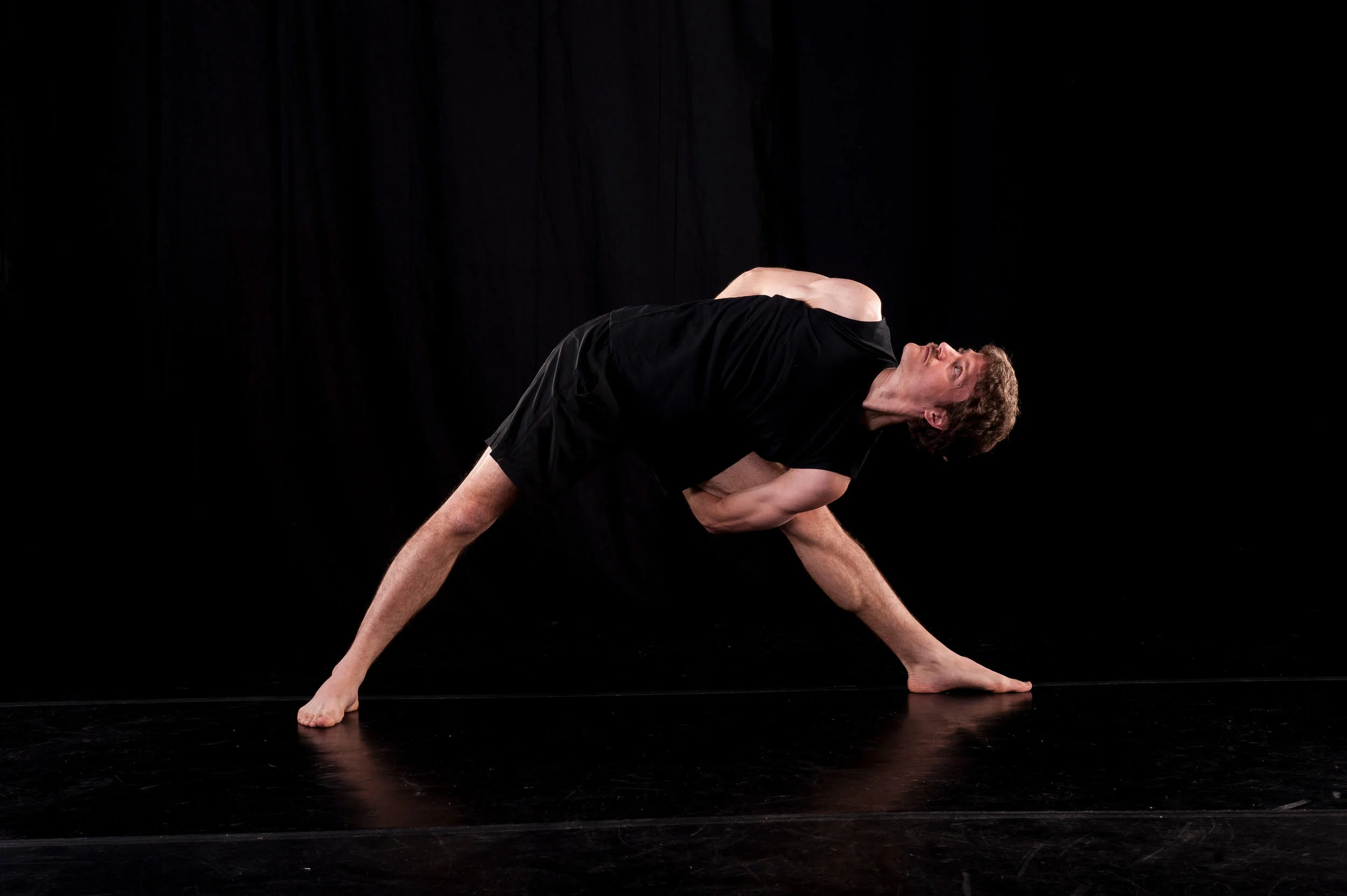 Stephen in triangle yoga posture