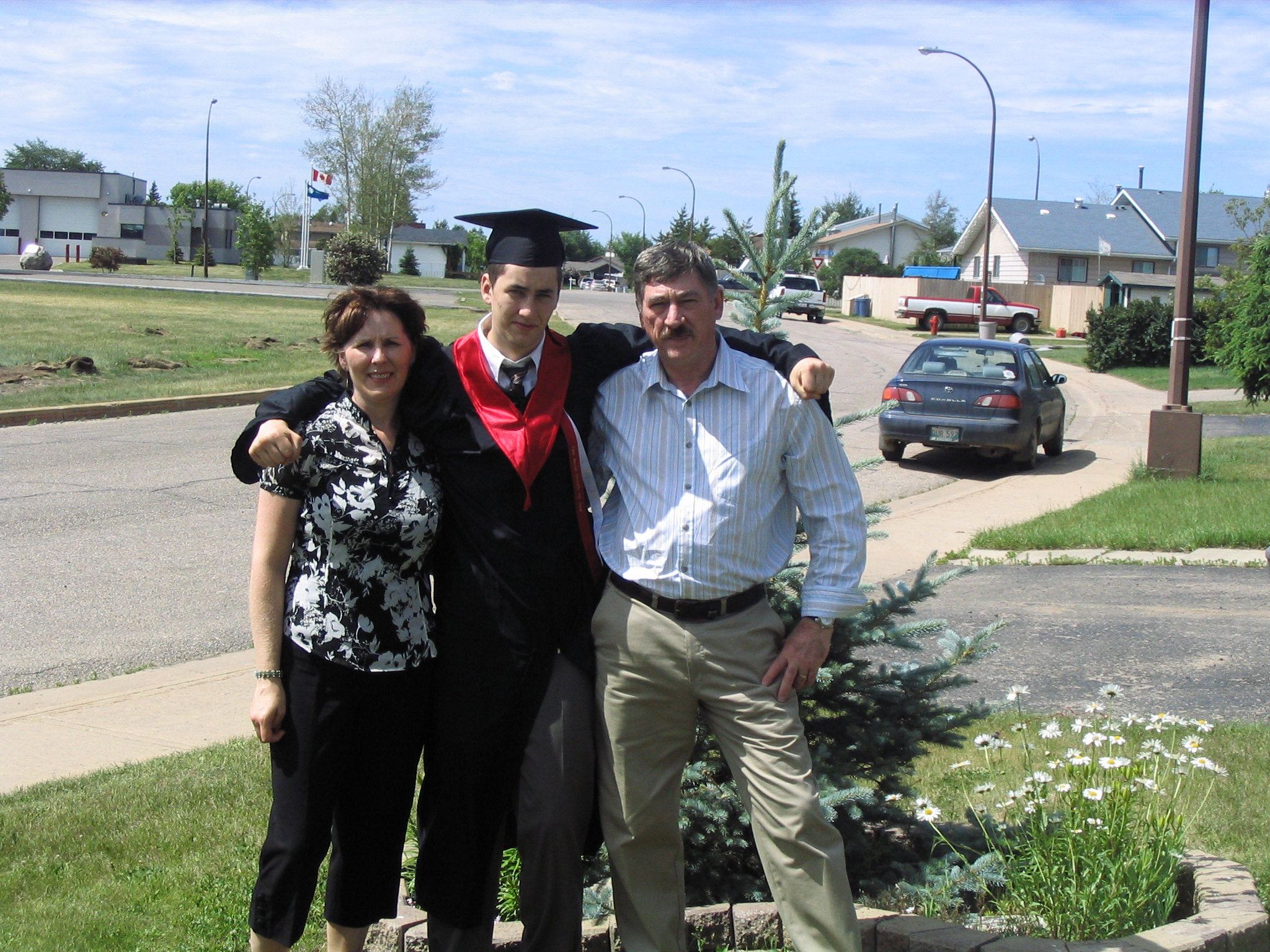 Keith with his parents, Carolyn and Dermont Nash, the day of his grade 12 convocation ceremony from Father Mercredi High School.