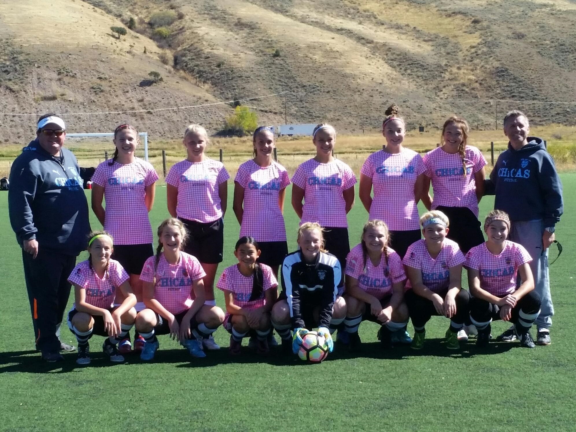 U14 Chicas Cyan, Jackson Hole Champions Coach Rich Tobias and Zak Stroud 