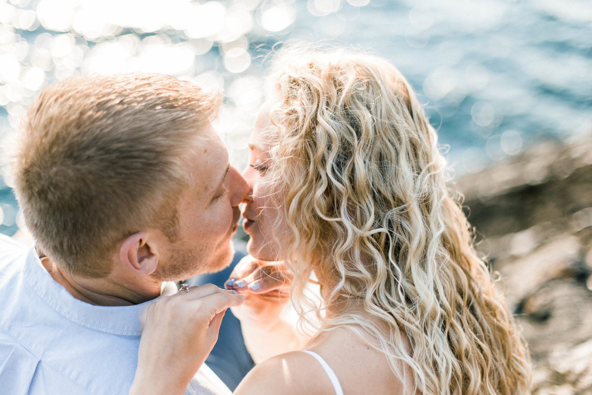  Her hands are signing for a kiss.&nbsp; 