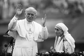 two saints in a photograph: Pope St. John Paul II and Mother Teresa. 