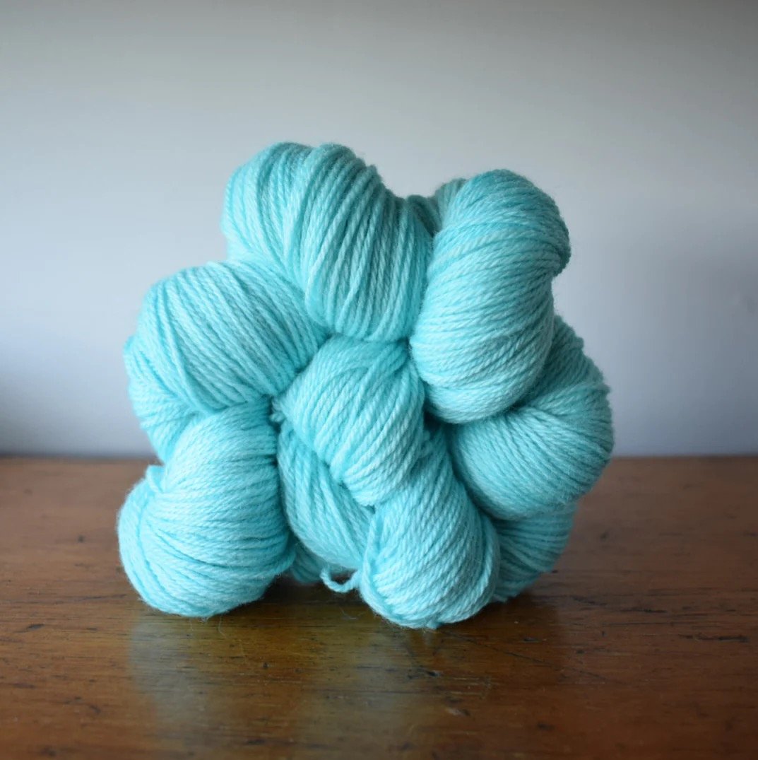 What looks good in a busy variegated yarn? Need pattern ideas using this  soft colorful DK/worsted weight merino ~1000 yds : r/knitting