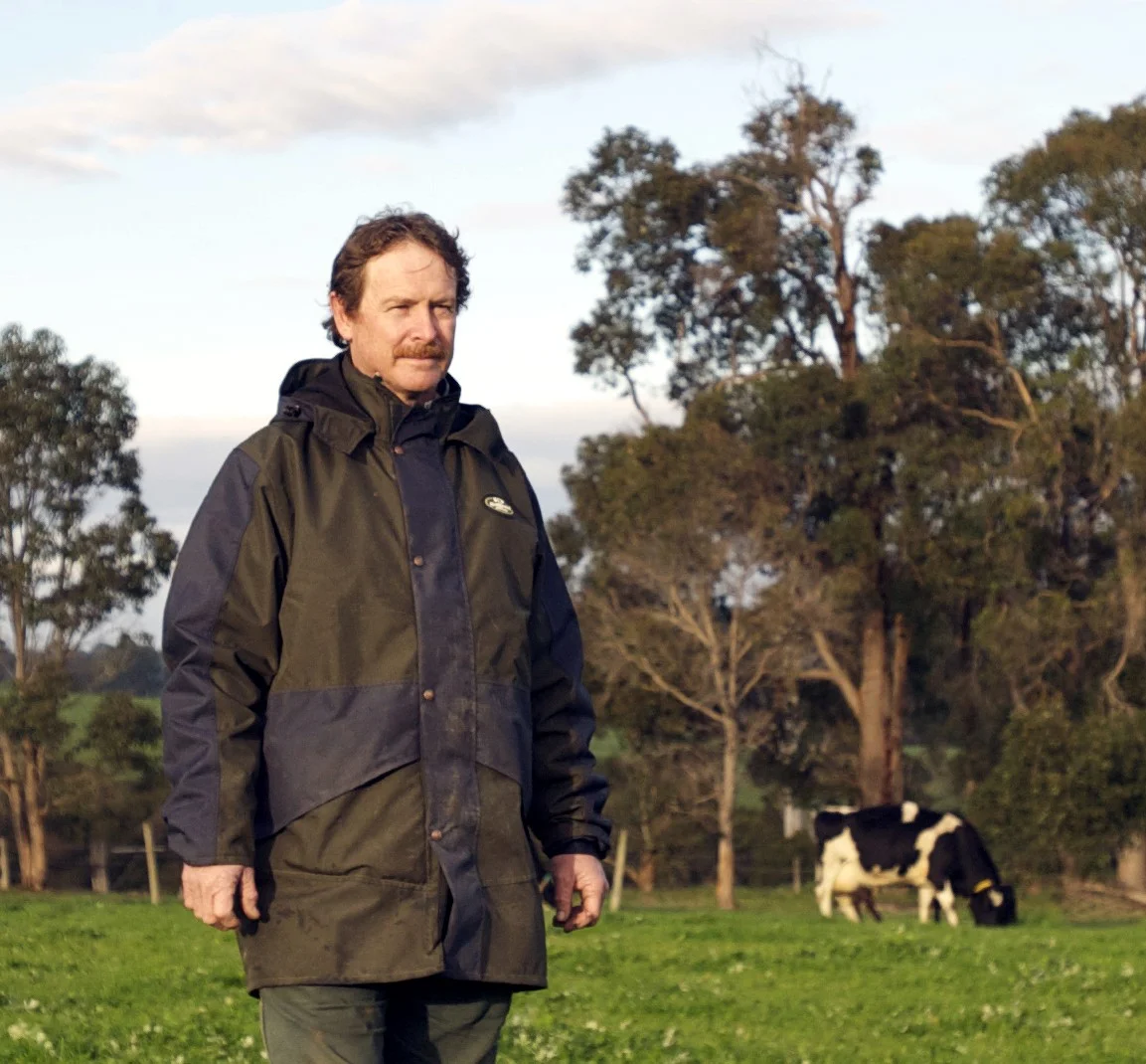 Tim with cows - resized.jpg