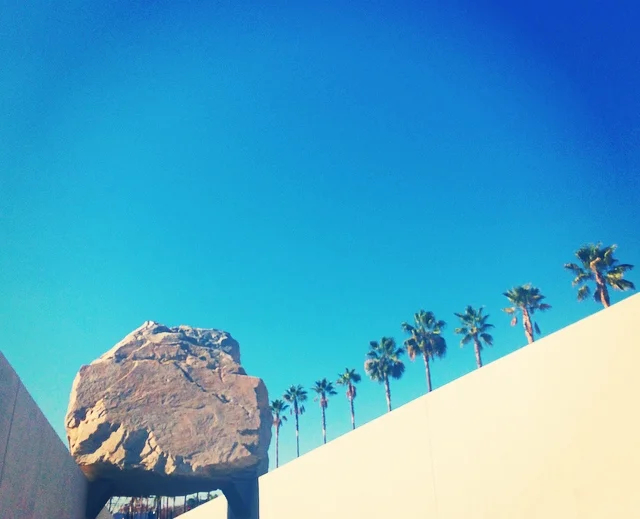 My favorite place to take pics in LA. LACMA's Levitated Mass . So many great snaps, with those palm tress working it at every angle.