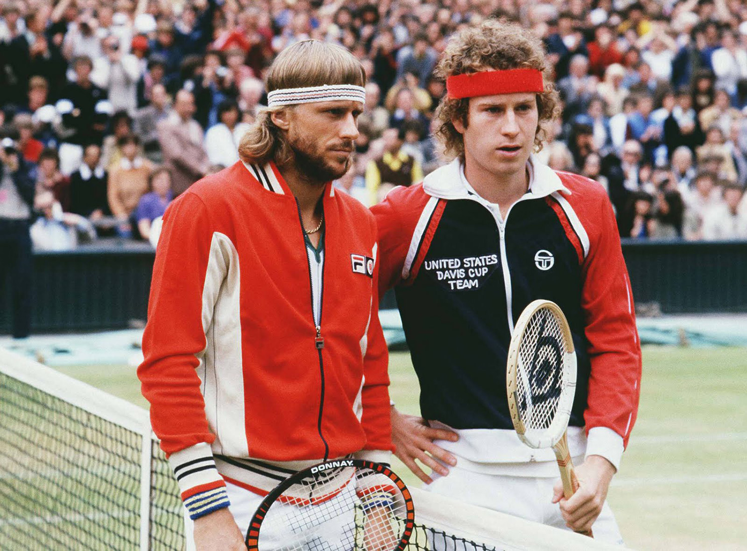 Rivals Bjorn Borg and John McEnroe making small talk before their match at Wimbledon in 1980. Well, more McEnroe talking and Borg just...not.