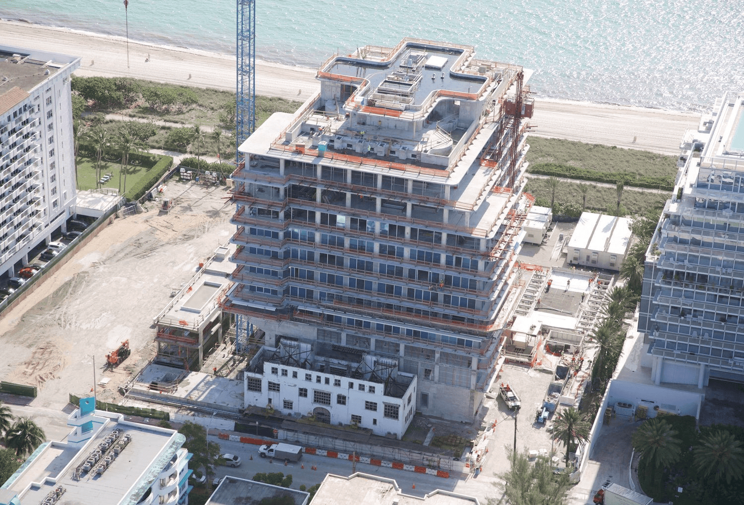 Aerial view of the historic façade in its final resting place, now integrated with the new residential development.