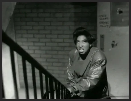 A towering apartment complex is the setting for the everyday drama of a woman trying to get home. Shara Nelson pictured in the promo video for Safe From Harm, directed by Baillie Walsh at a disused tower block in London, April 1991.