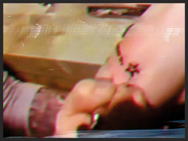 The newly revamped MassiveAttack.com features this one blurry yet cryptic new image.