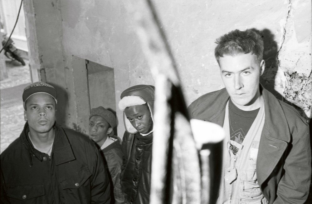 3D, Mushroom and Tricky pictured between filming of the Safe From Harm video in a disused London block of flats in 1991. 