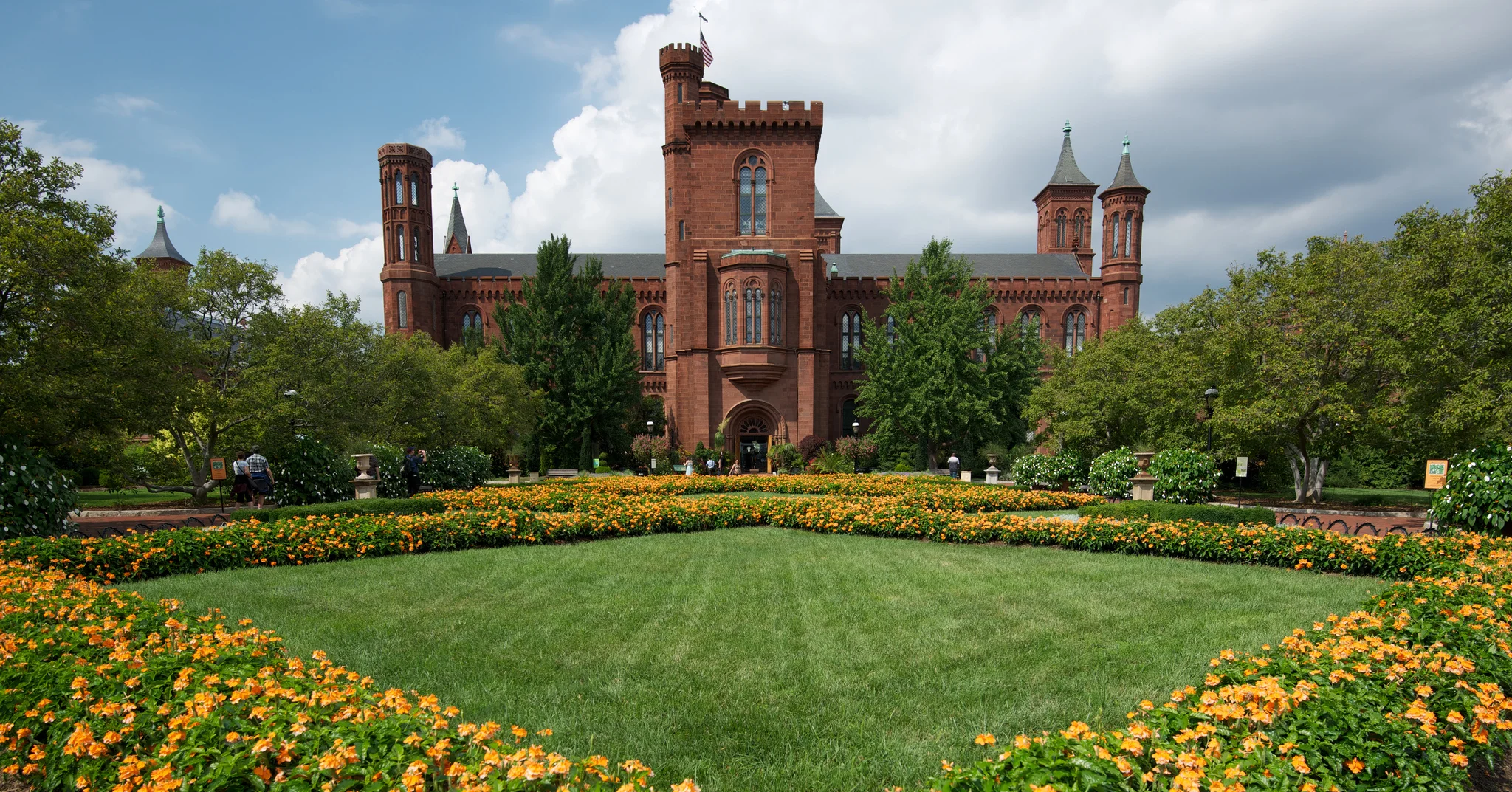 " Smithsonian Castle & Parterre " by Robert Lyle Bolton licensed under CC BY 2.0.