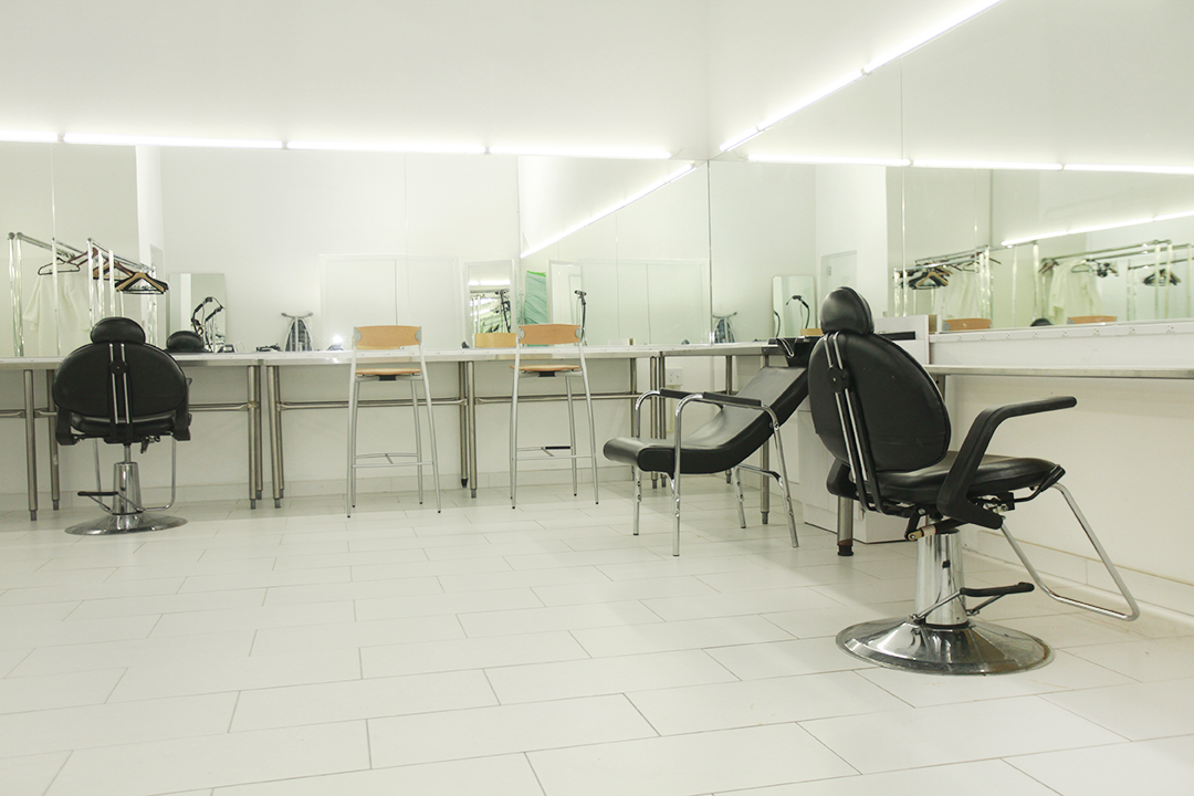 434 sq ft Dressing Room - Three walls mirrored, functional hair sink with two salon chairs. Wardrobe racks, hangers, steamer, iron/ironing board are available for rental
