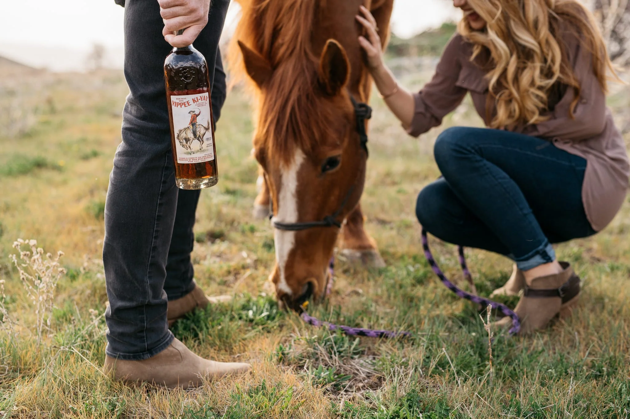 Portrait of couple with horse in Park City, Utah during the summer. 