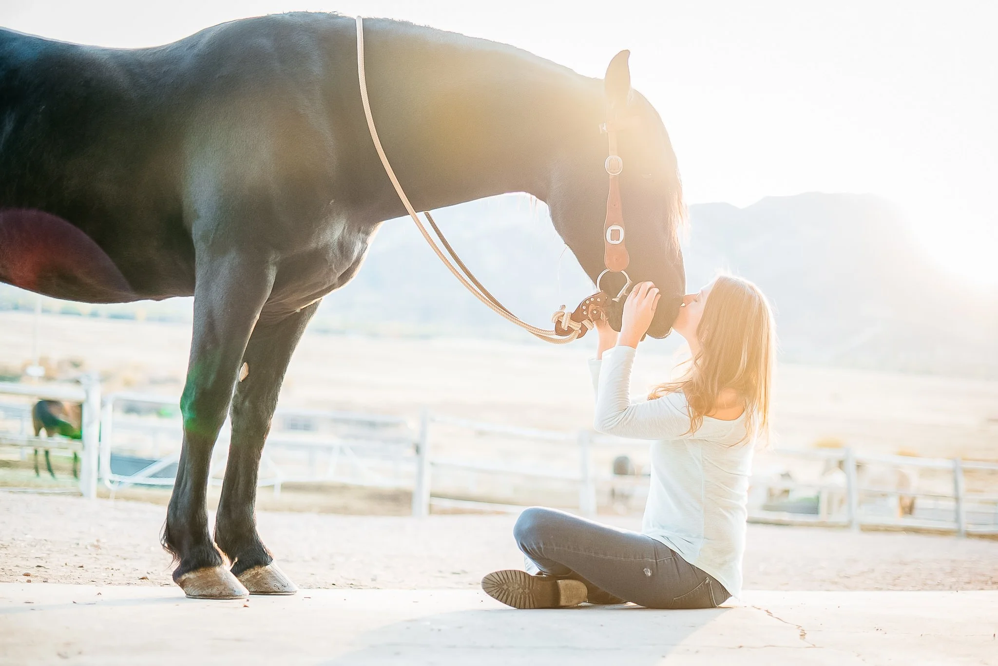 Portrait of woman with her horse in Park City, Utah during the summer. 