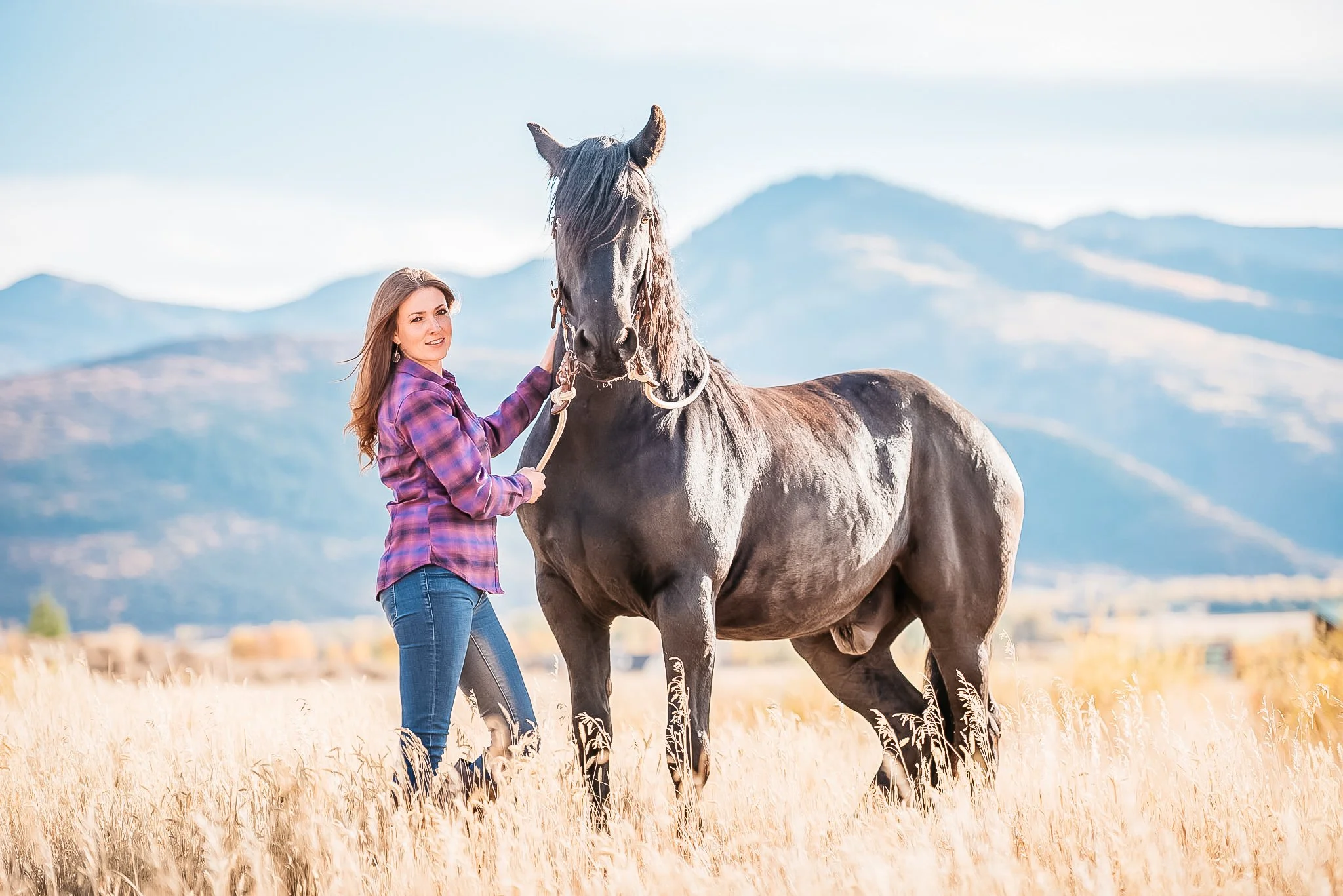 Portrait of woman with her horse in Park City, Utah during the summer. 