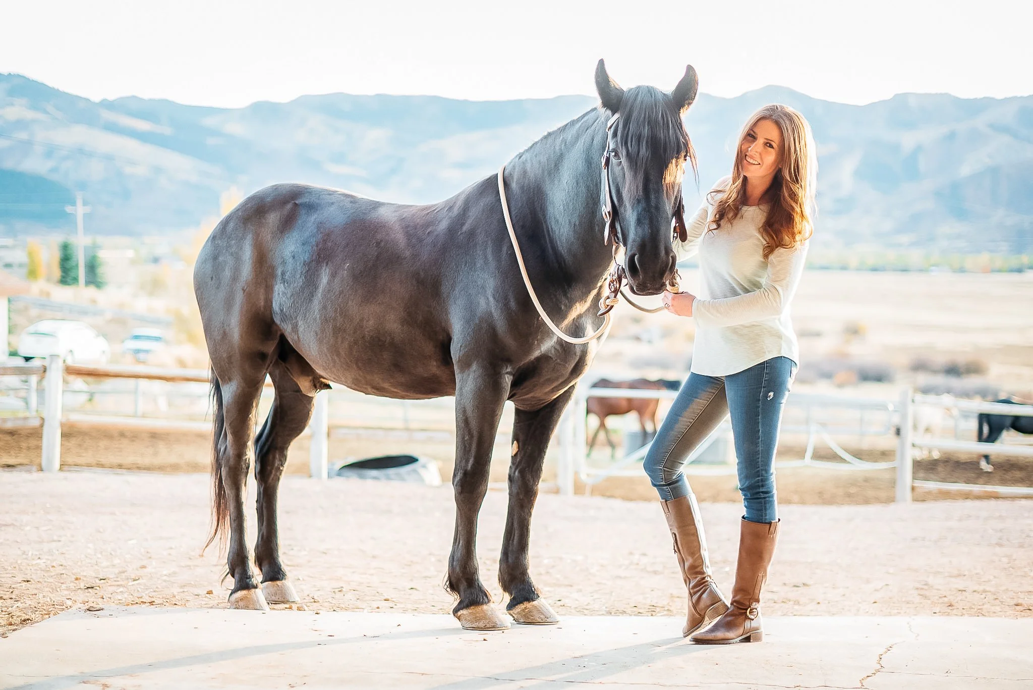 Portrait of woman with her horse in Park City, Utah during the summer. 
