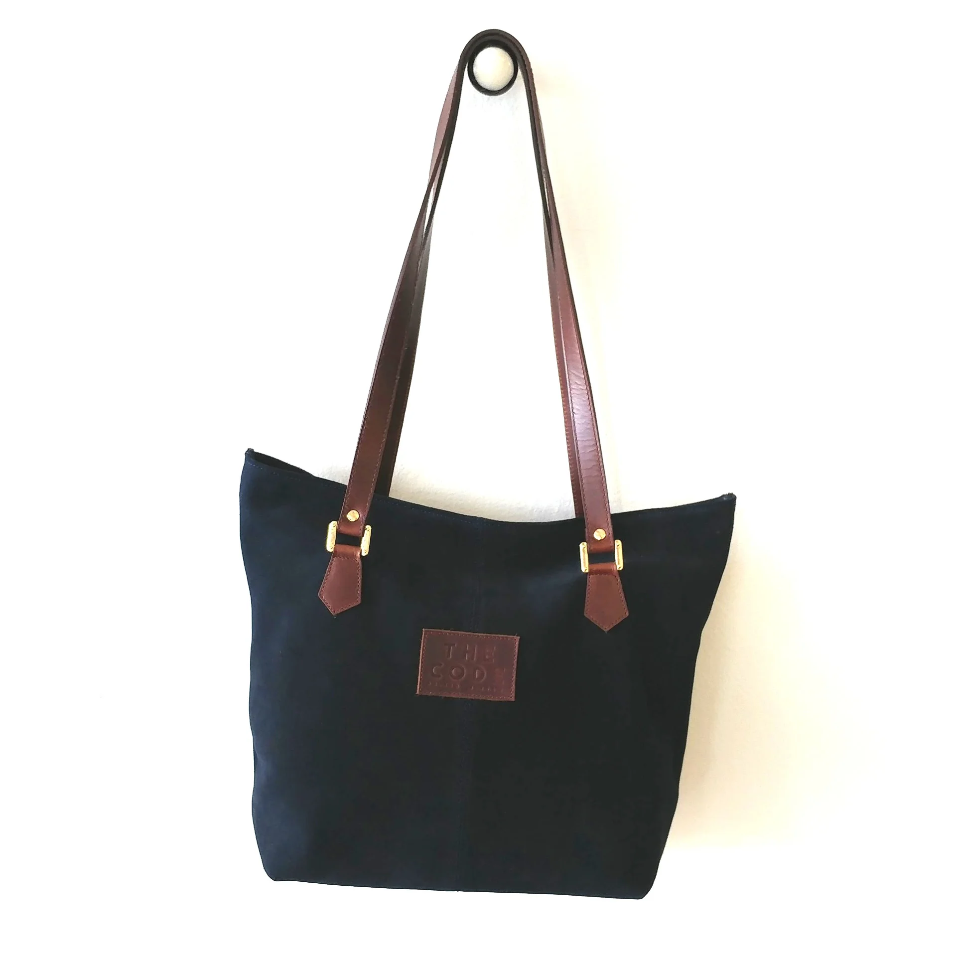 navy suede handbag