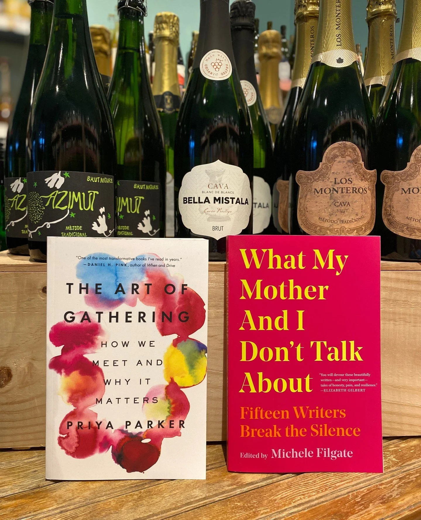 Couple reads &amp; bottles that might come in handy for tomorrow and other gatherings this holiday season! 🥂📚️ We'll also be open tomorrow (November 27) from 12-3pm for all of your holiday needs.