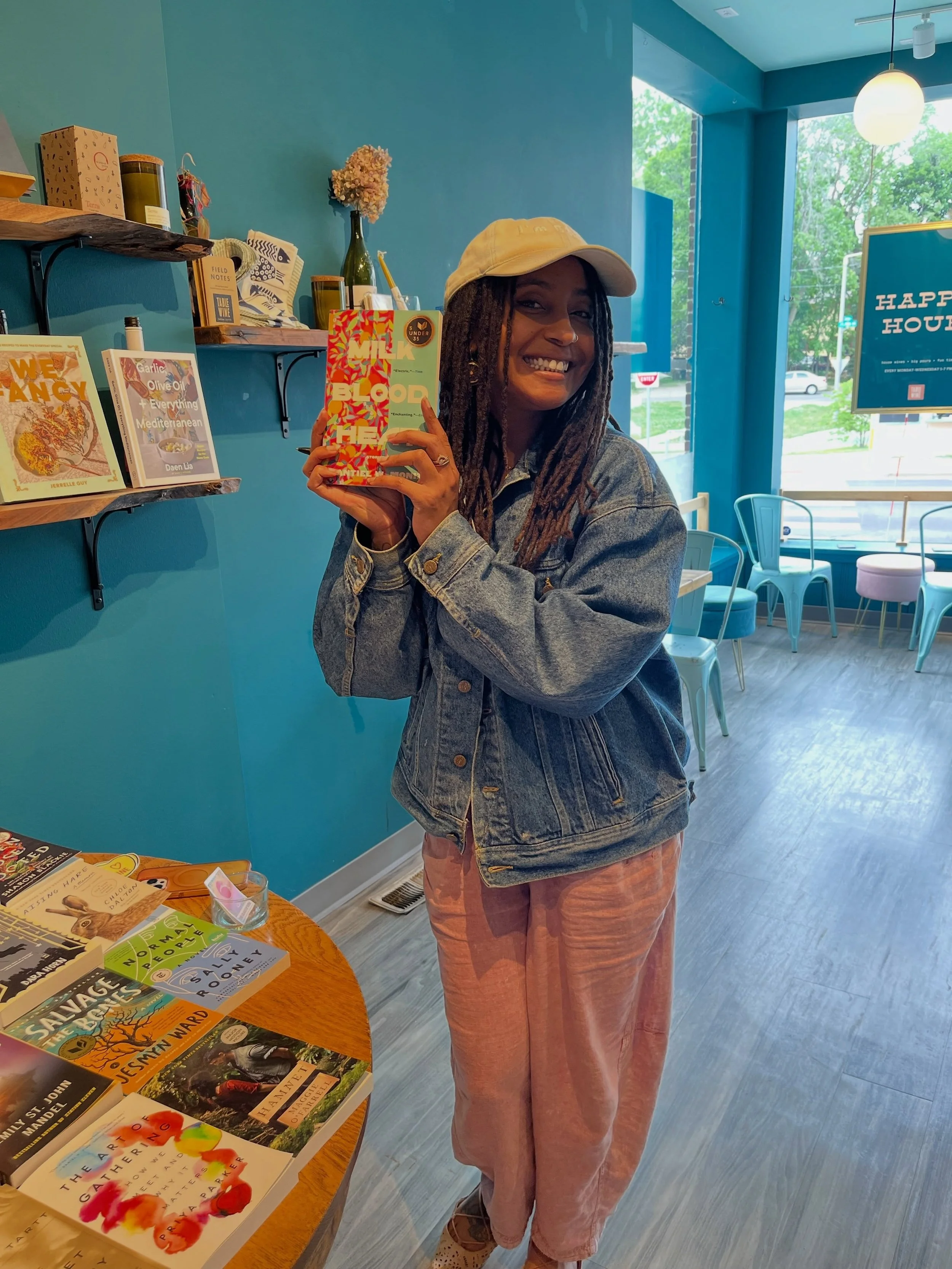 Look who stopped by for ros&eacute; and just happened to sign her book! The one and only Dantiel Moniz (@deezybotpress), one of our all-time favorite short story collections. 📖