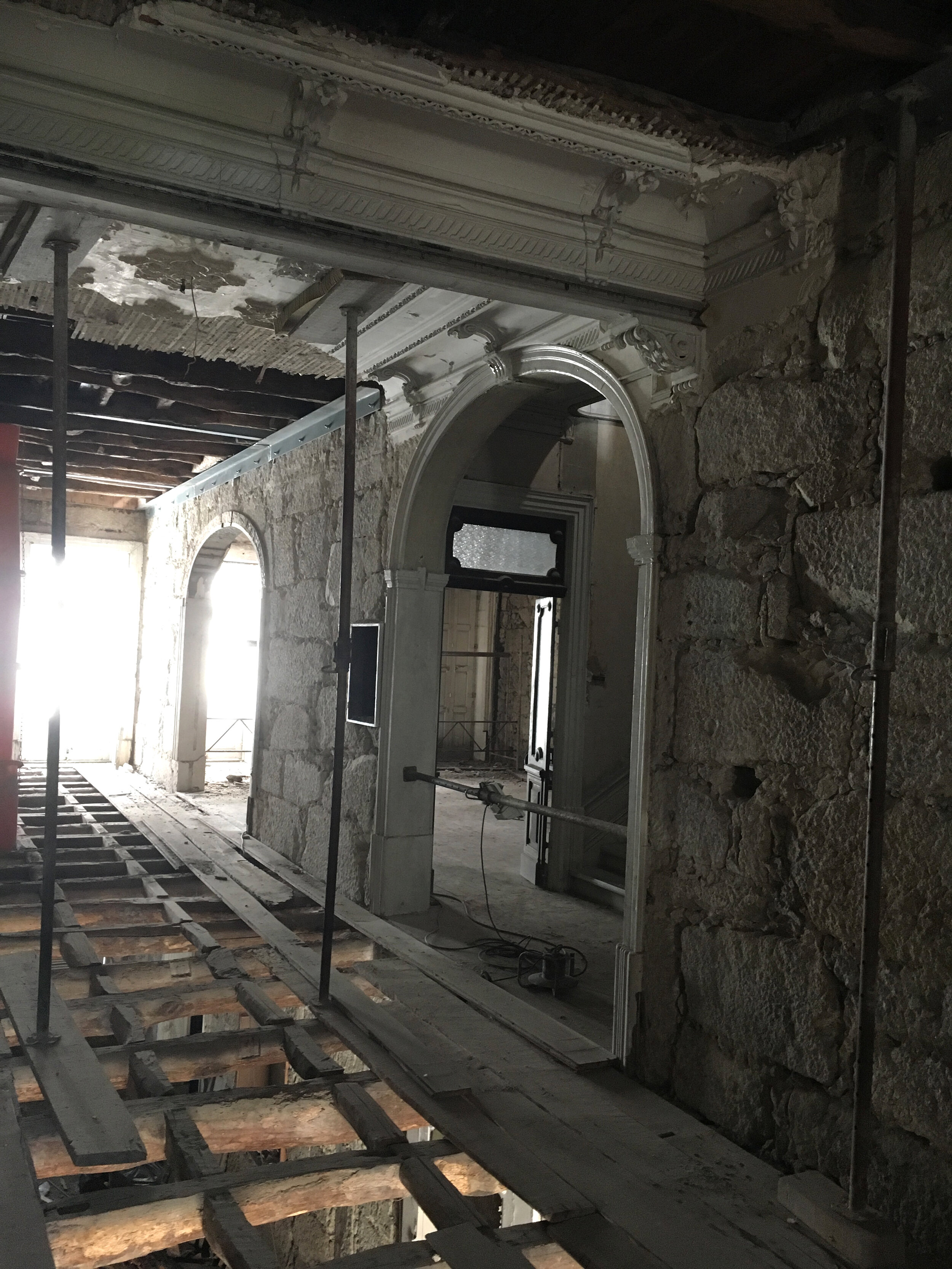 View through the front door of apartment C with preexisting floor joists