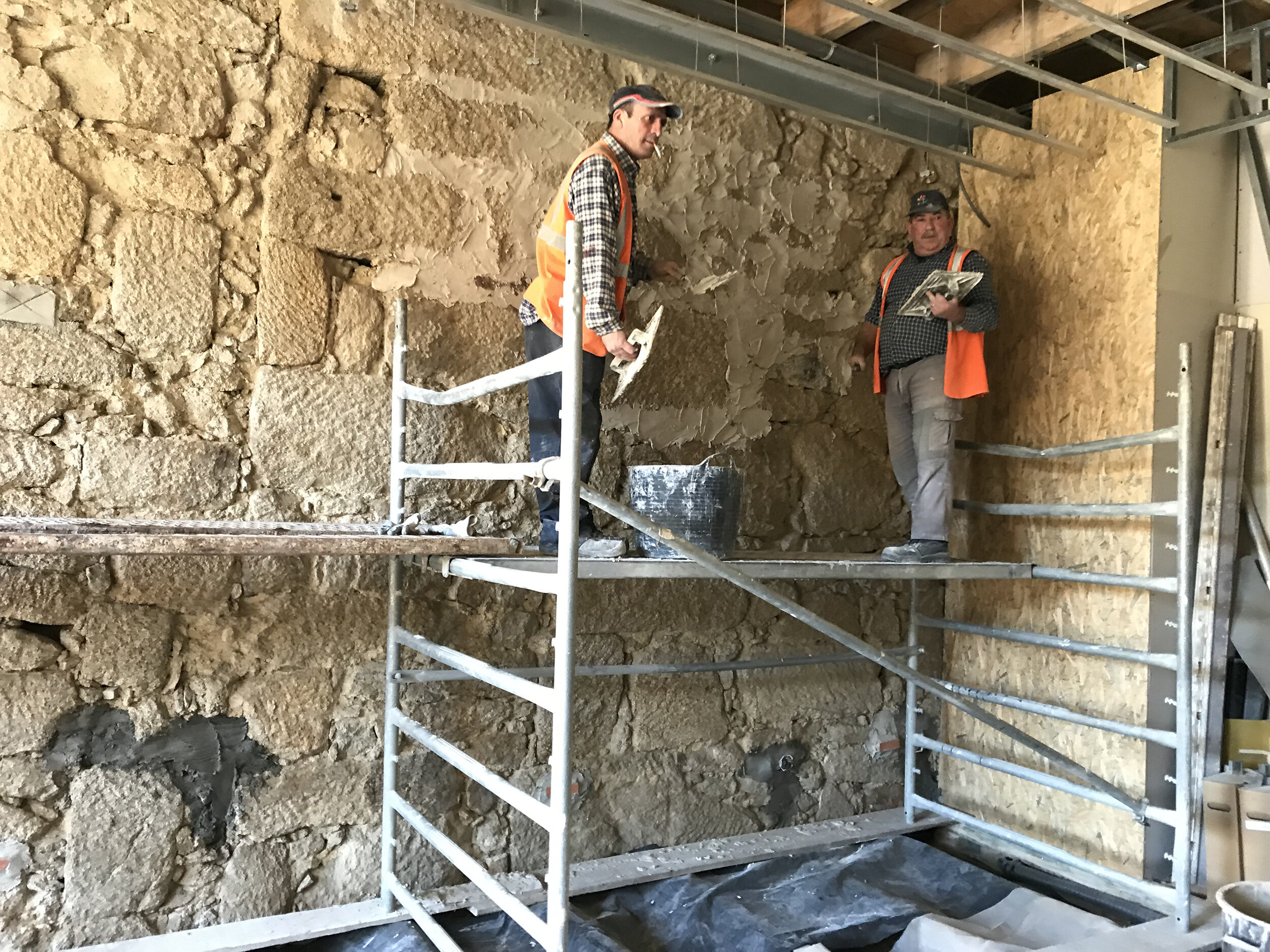 Plastering the walls in apartment C