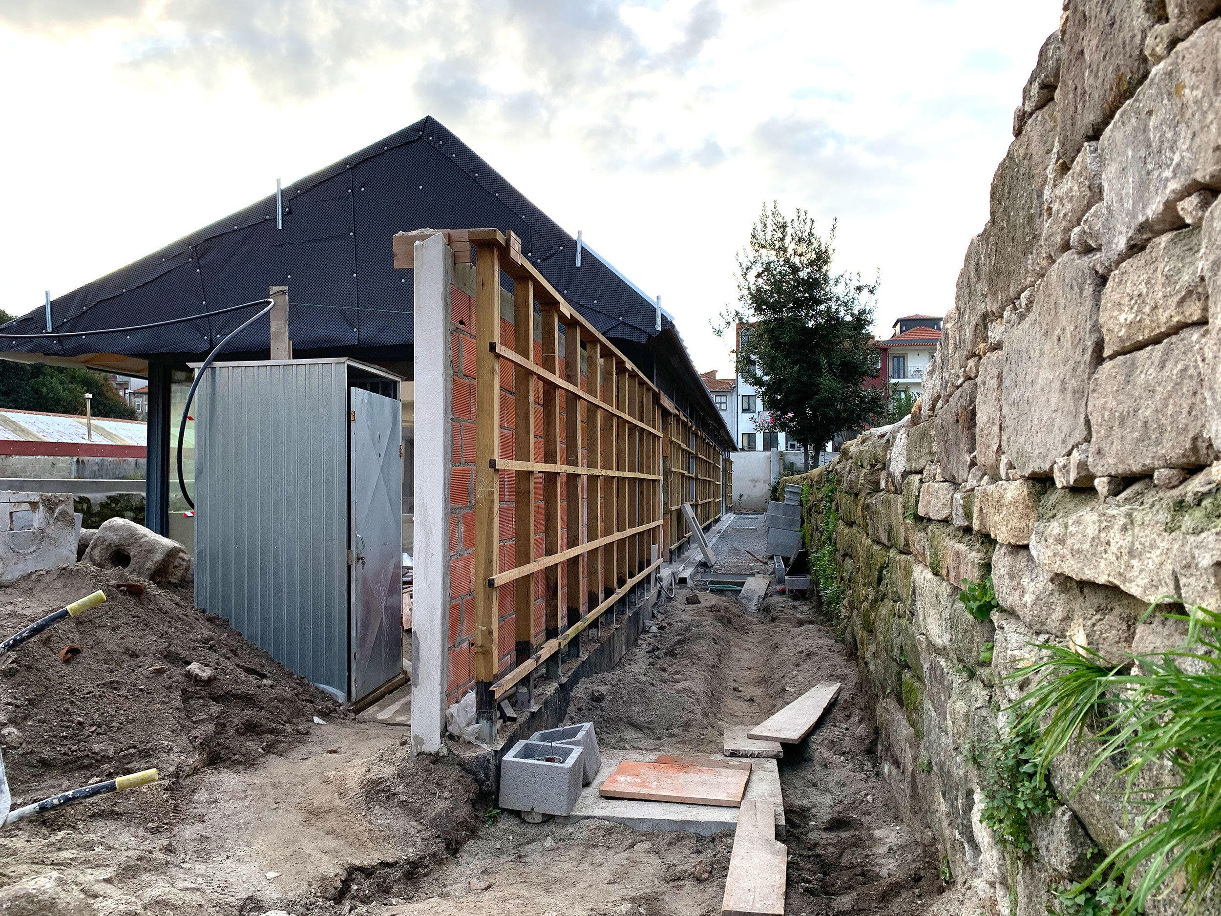 Construction of walkway along the rear building