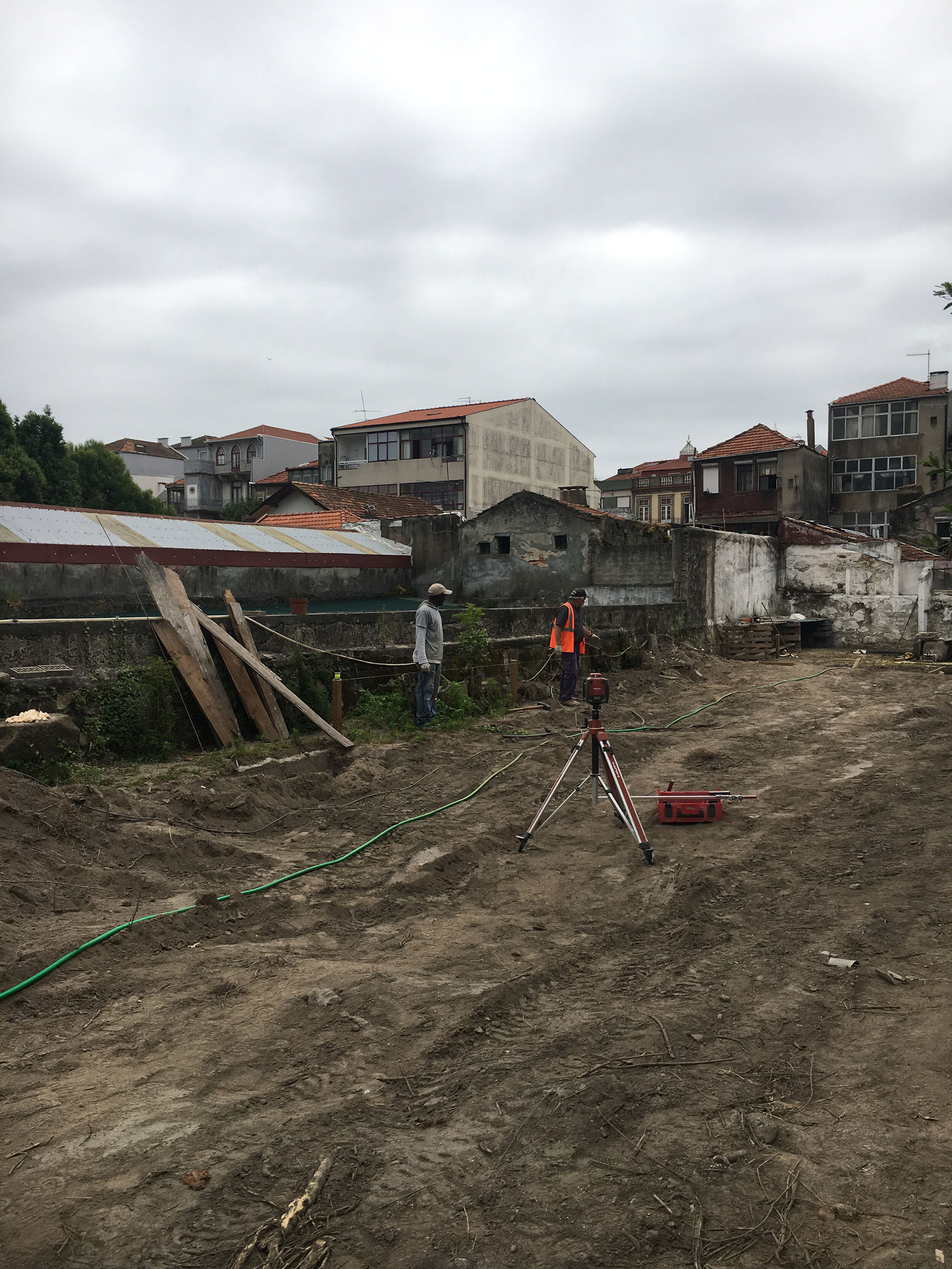 surveying the rear building site