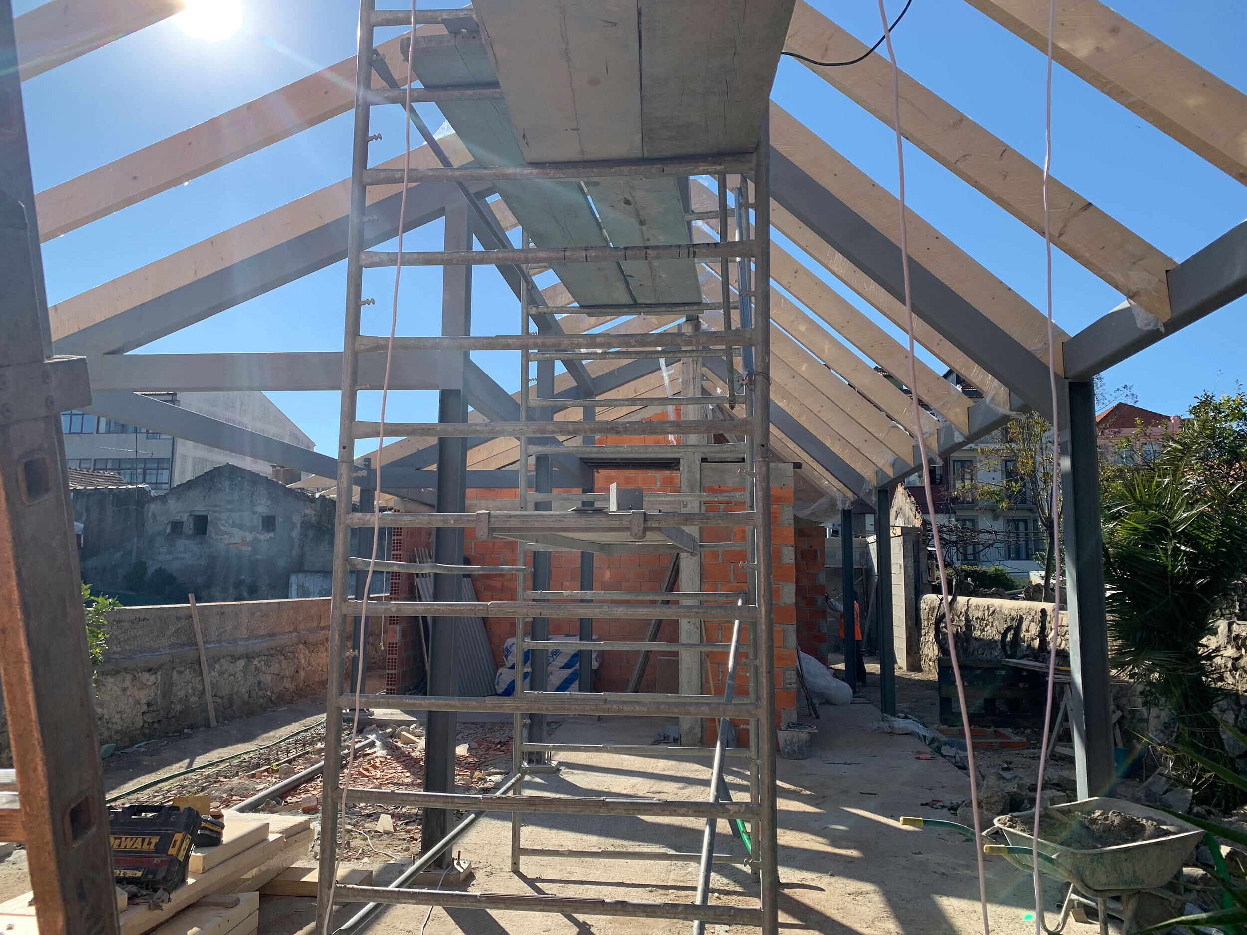 Rafters in Apartment I and ironwork for the patio area