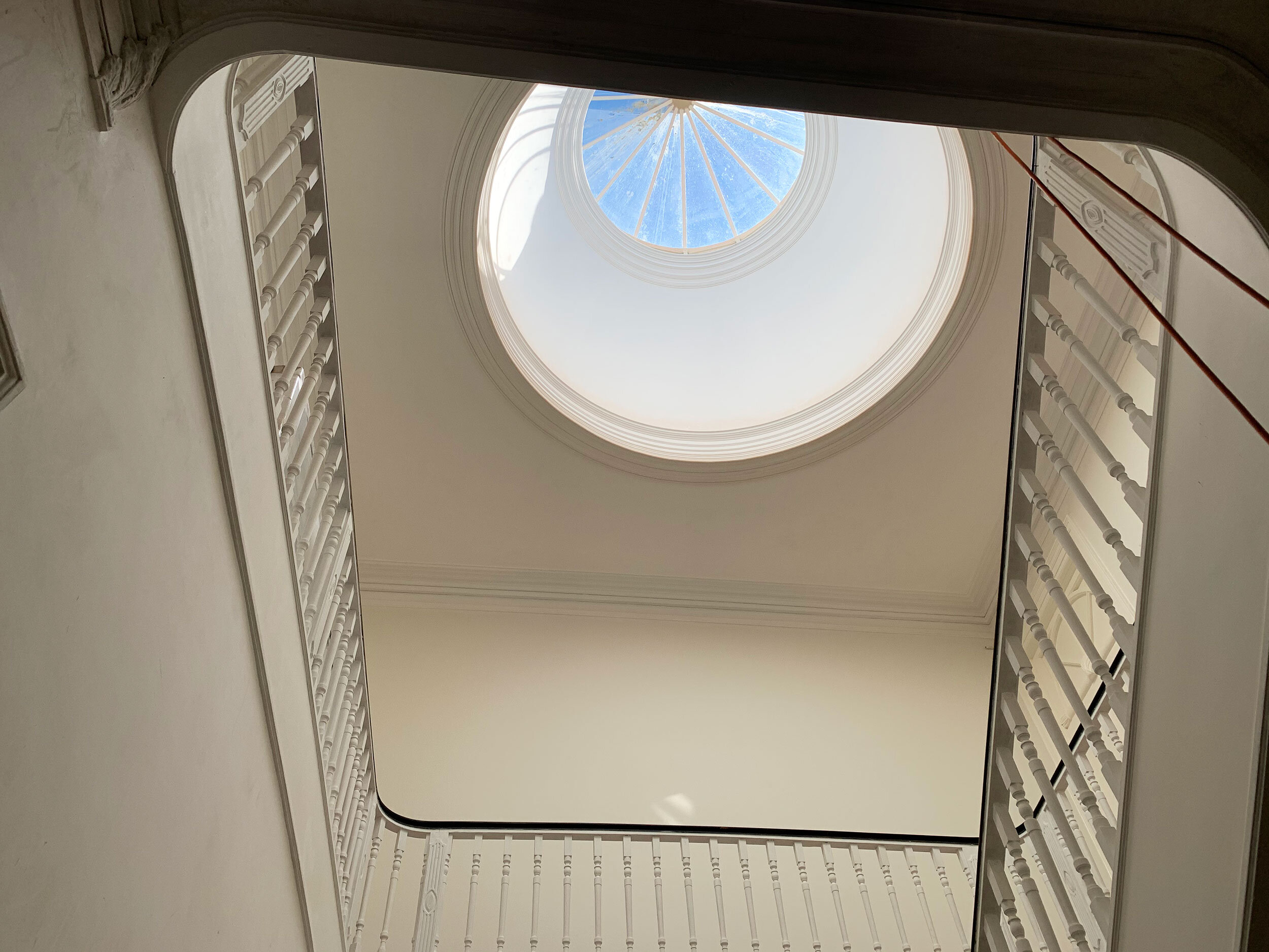 The restored skylight illuminating the stairways