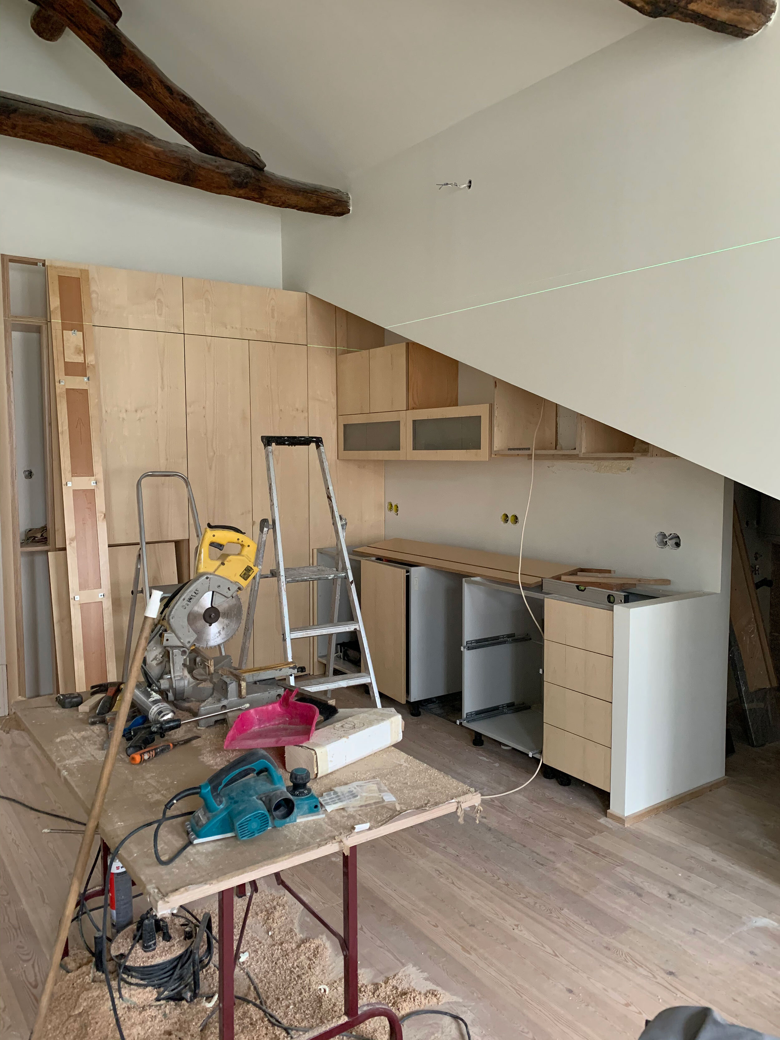 Installing the sycamore wood kitchen in Apartment F