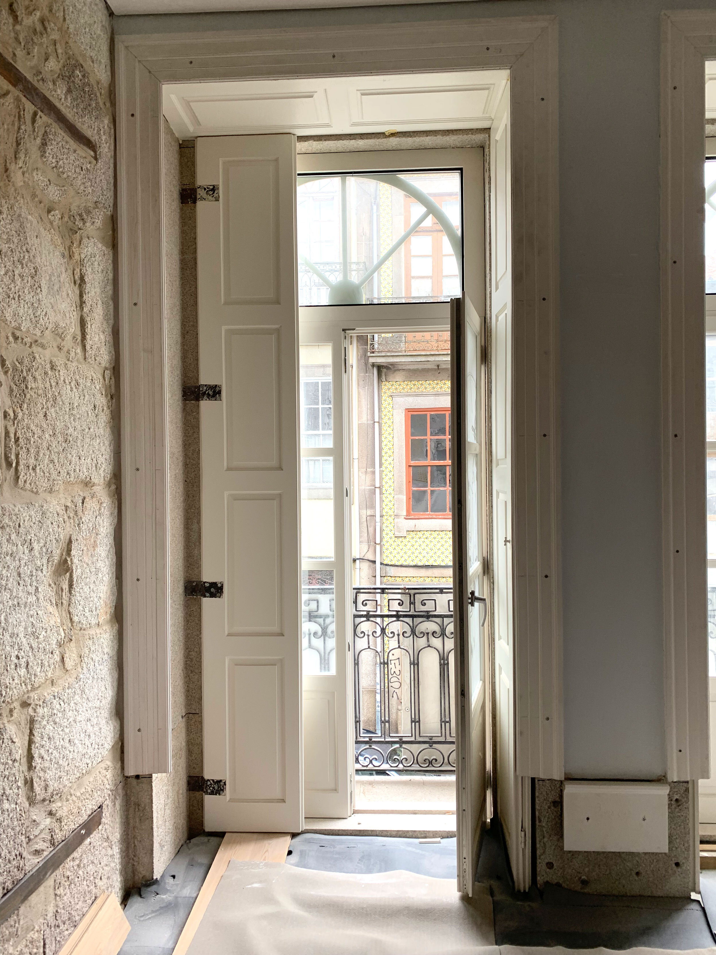 Restored doors in Apartment D with iron work