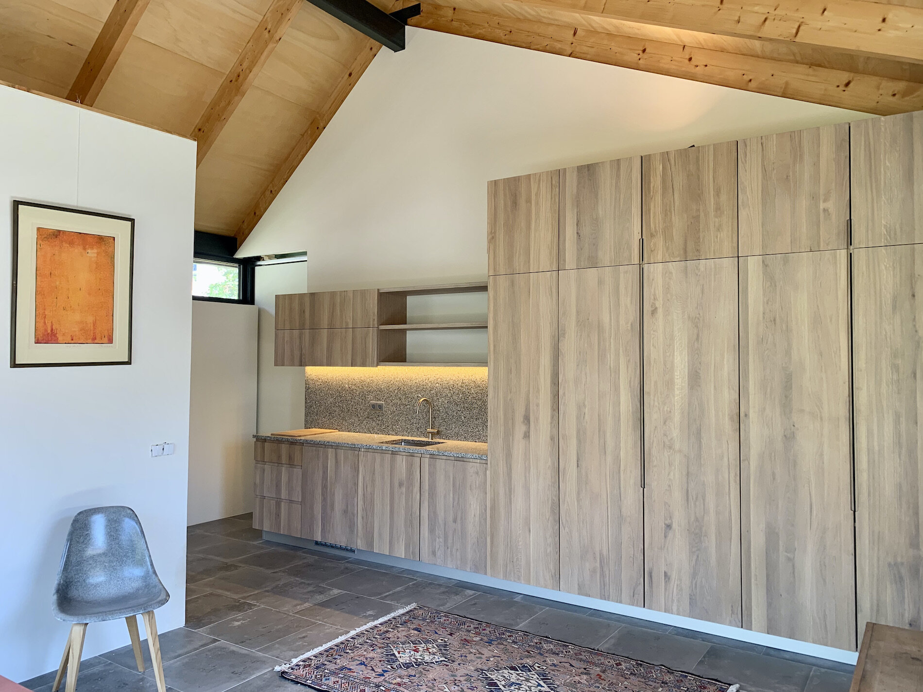  Kitchen area and oak clothing closets. 