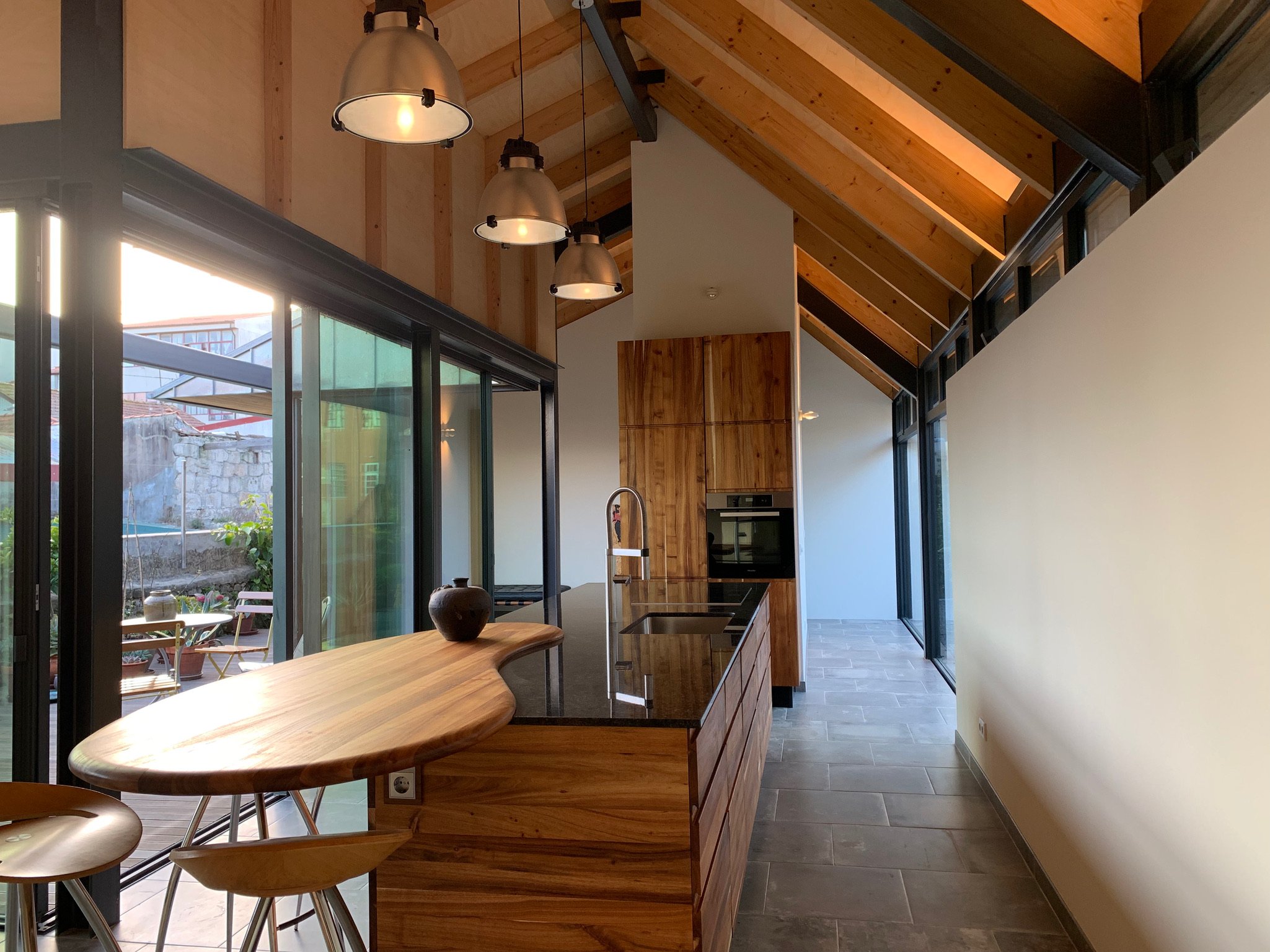 View of the dining area looking onto the deck of apartment I