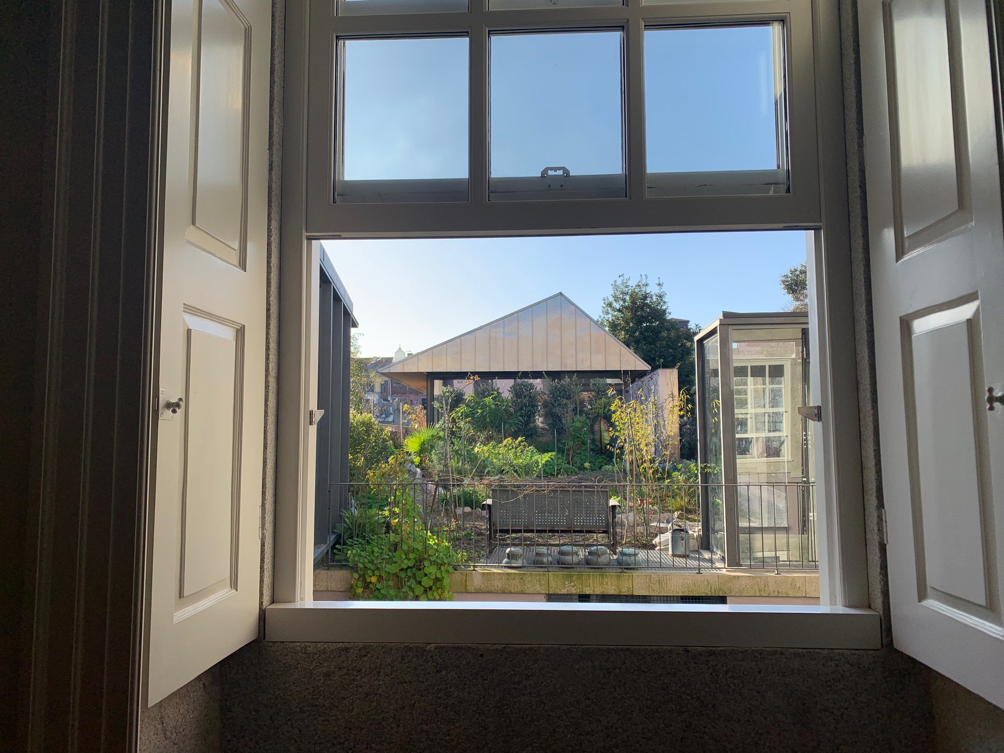 View into the garden from Living area of apartment C