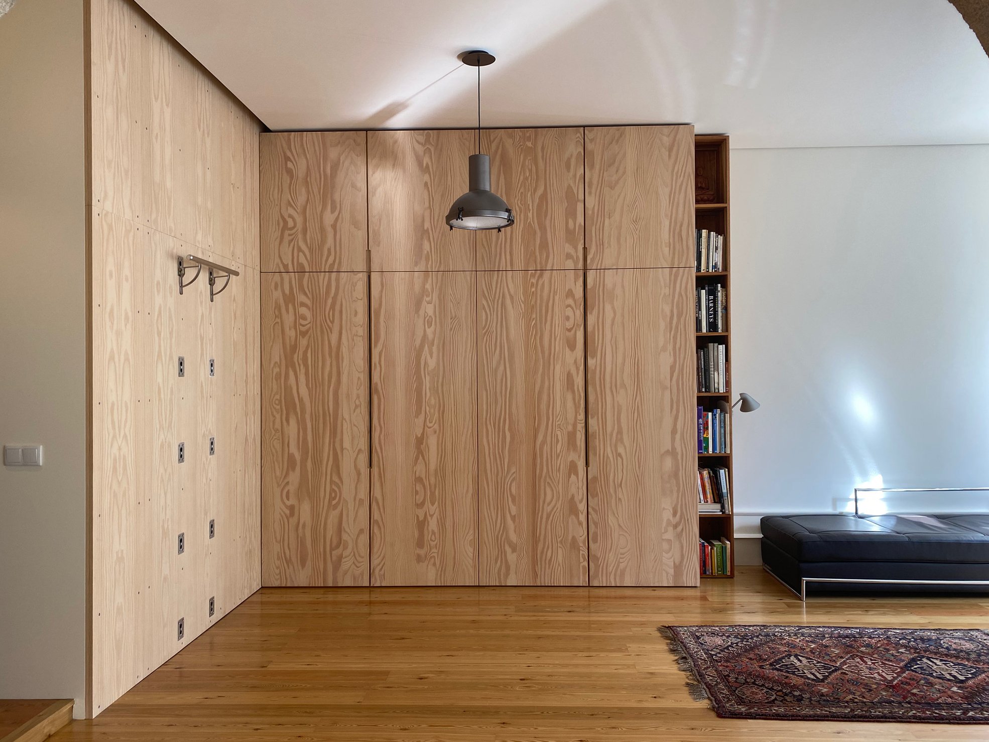 Yoga wall and storage area in apartment D