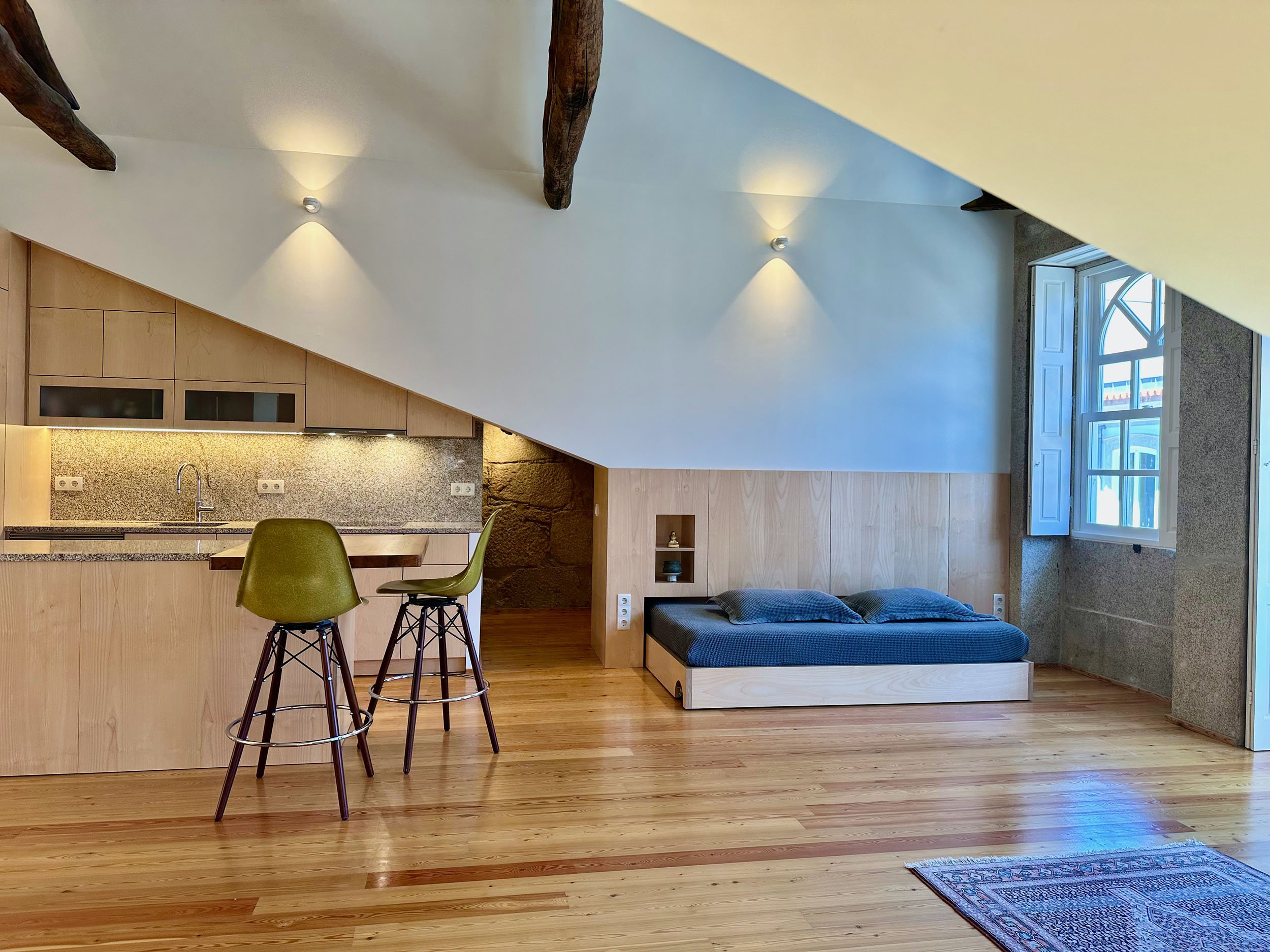   Kitchen area and retractable bed  