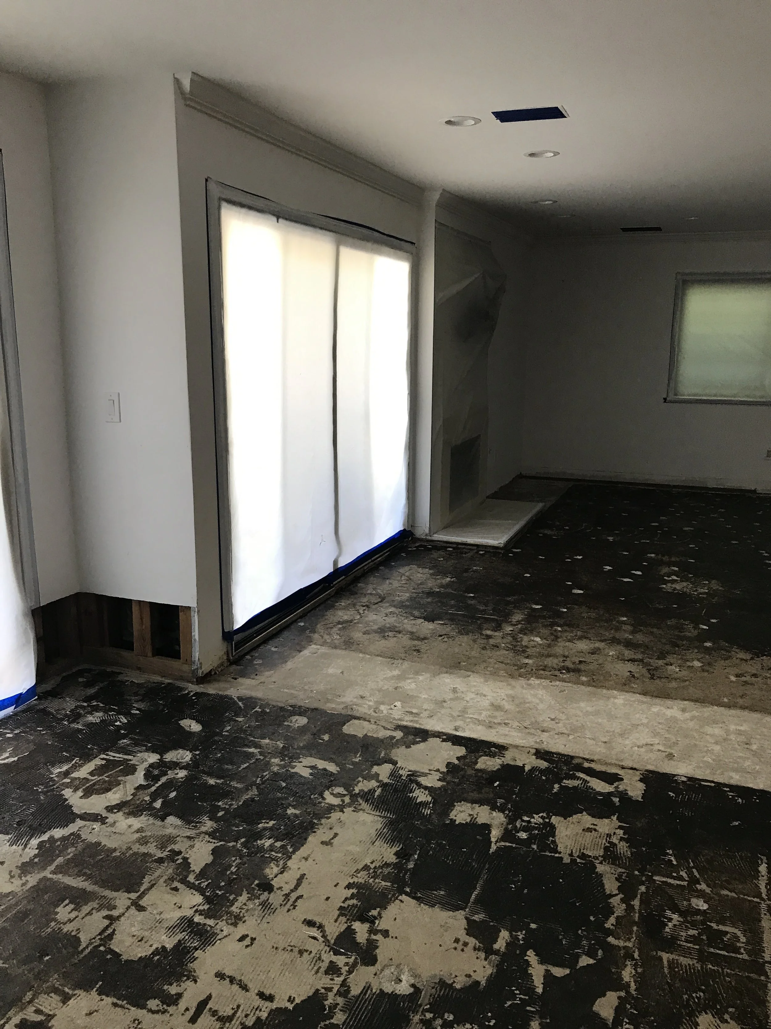 LED lighting, concrete style tiles on fireplaces and hardwood floors.