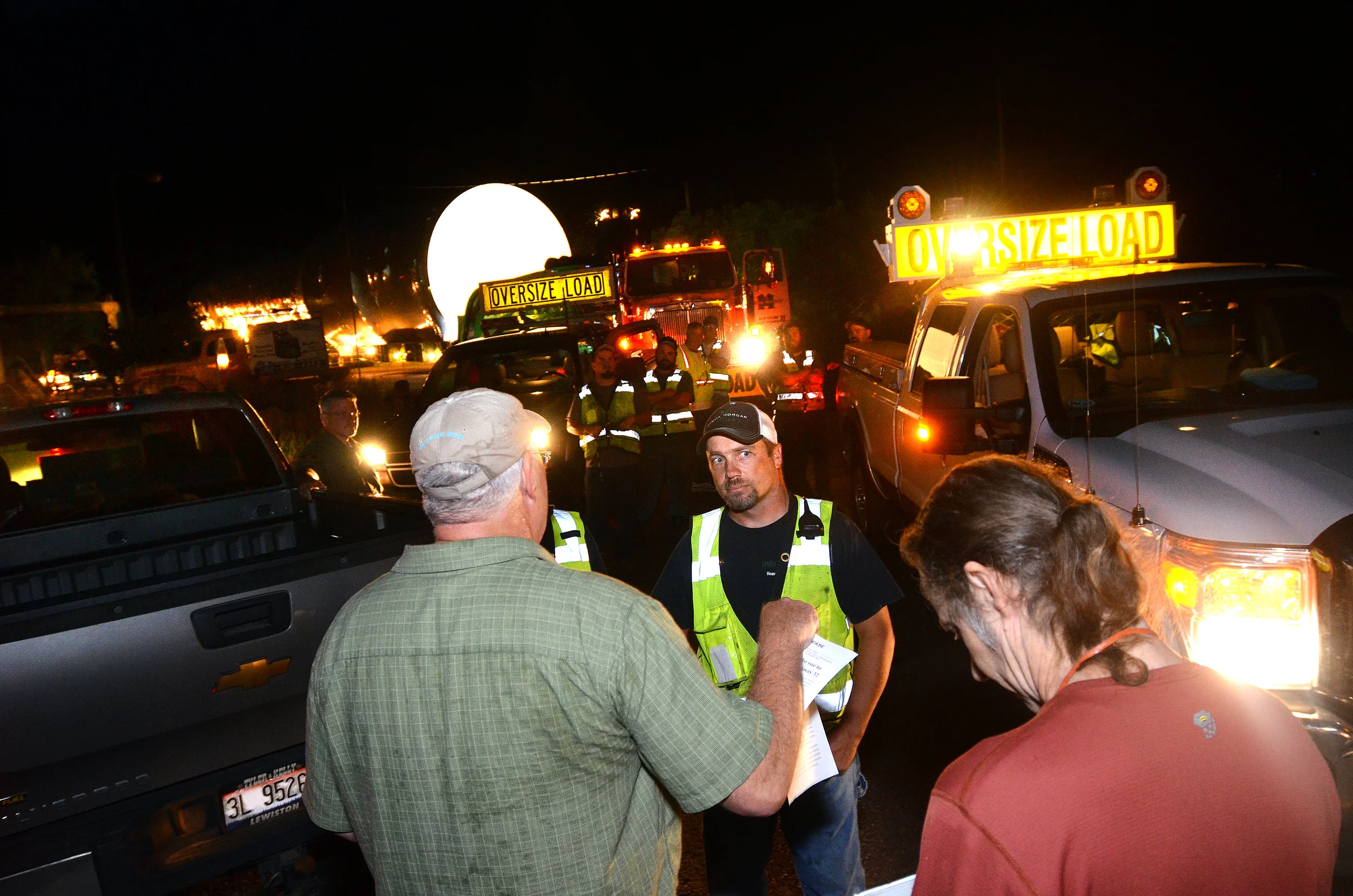 IRU Executive Director Bill Sedivy talks with the driver of a controversial Highway 12 megaload in August 2013. Photo (c) The Lewiston Morning Tribune.