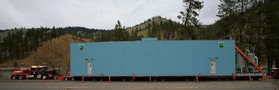 Imperial Oil's big blue test module was designed to help determine the navigability of rural Idaho and Montana roads between the Port of Lewiston and the Canadian border. Trucked from the Port of Lewiston to Lolo Pass on the Montana-Idaho border in May 2011 the shipment pulled down power lines and knocked out power to customers along the Clearwater River. (Photo by Kevin Lewis)