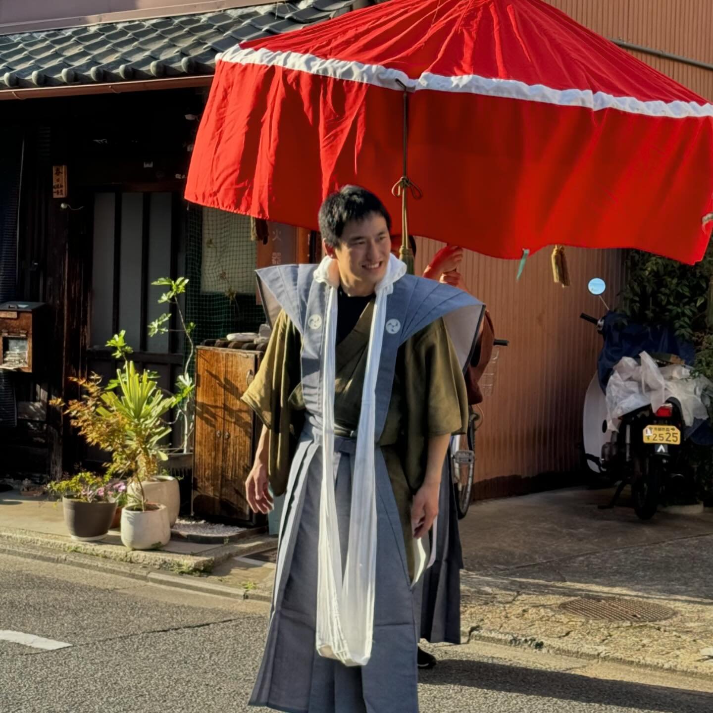 Genbu Yasurai Festival passed by the new studio today. 1000+ year history. Considered one of Kyoto's 3 'strange festivals.' perfectly weird. I was invited under the umbrella to shield from illness and evil, along with my curious neighbors. The 'weird