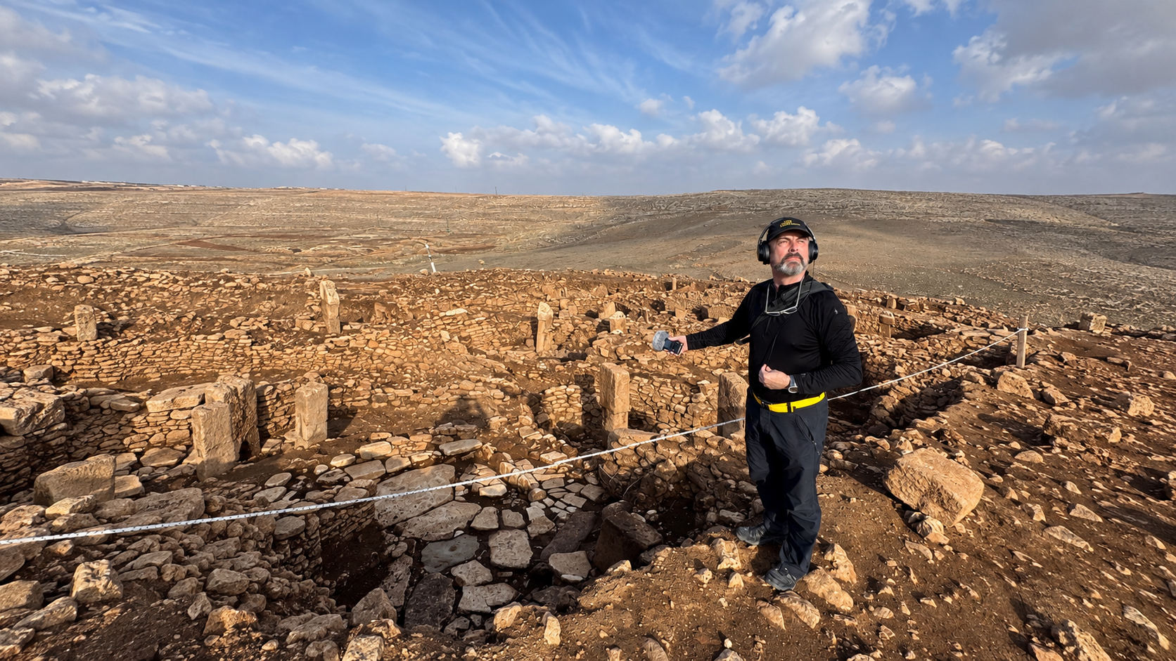 Charles Lindsay recording sound at the archaeological site of Karahan Tepe in southeastern Türkiye.
