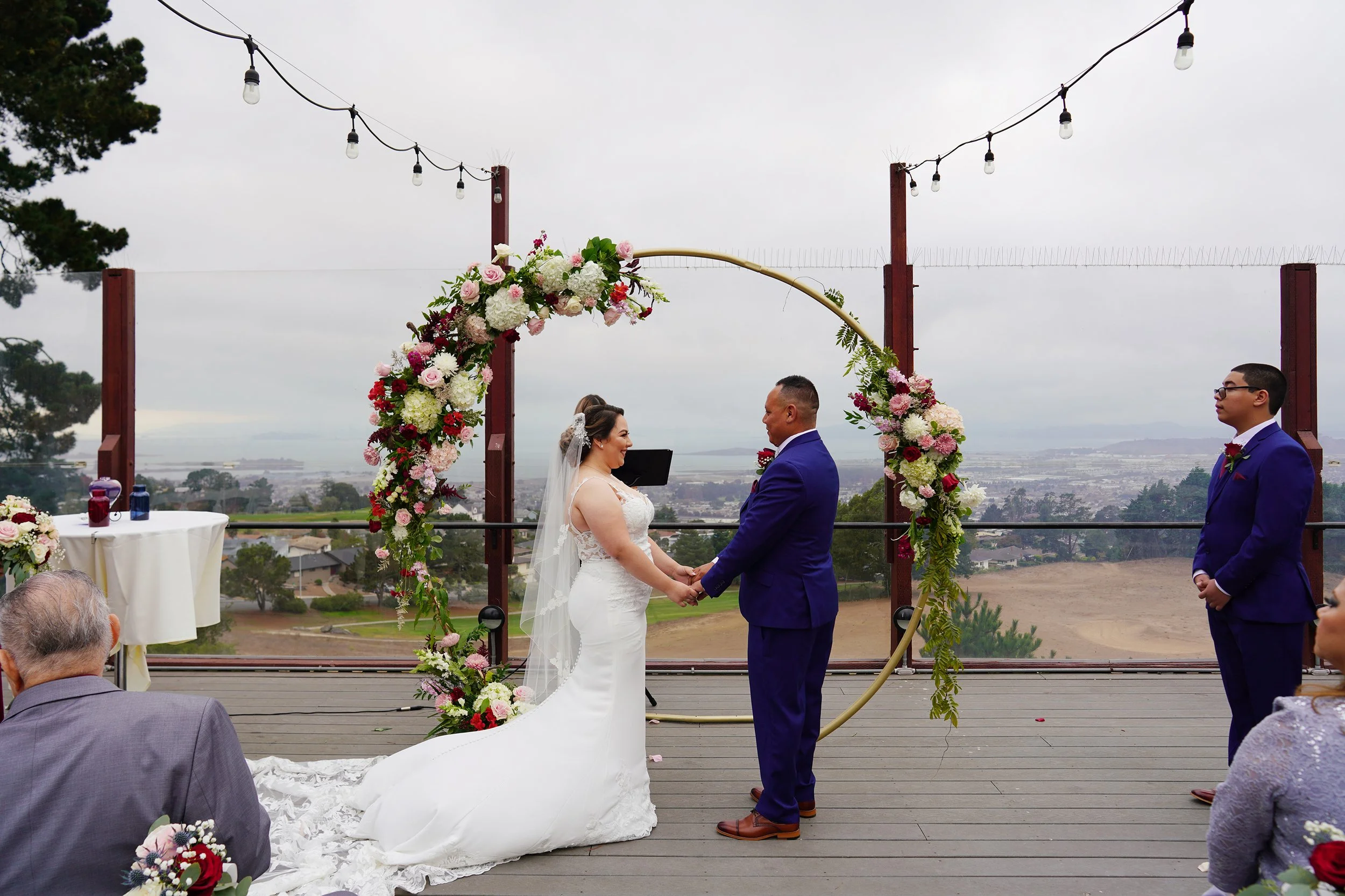 jose-and-rebecca-holding-hands-luxury-wedding-viewpoint-berkeley-country-club.jpg