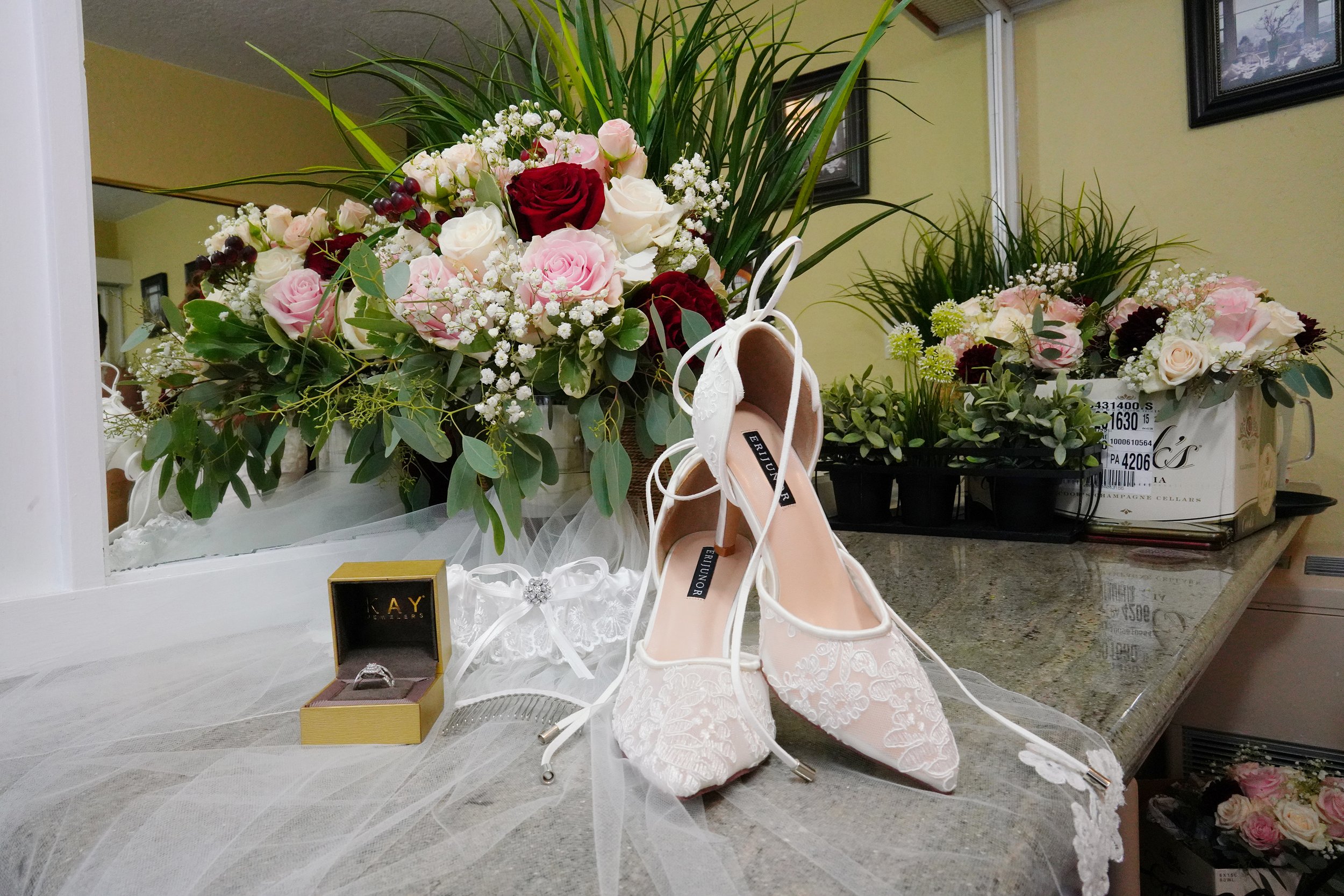 luxury-wedding-details-shoe-ring-veil-flowers-berkeley-country-club.jpg