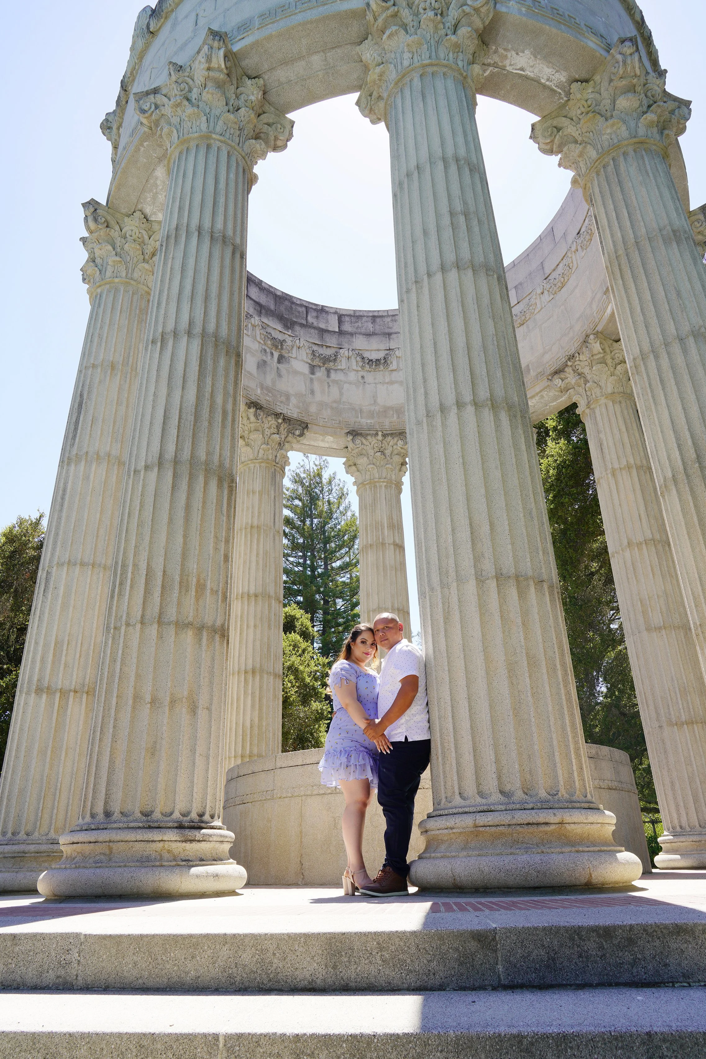 jose-and-rebecca-hugging-celebrating-engagement-water-temple-san-mateo-luxury-photography.jpg