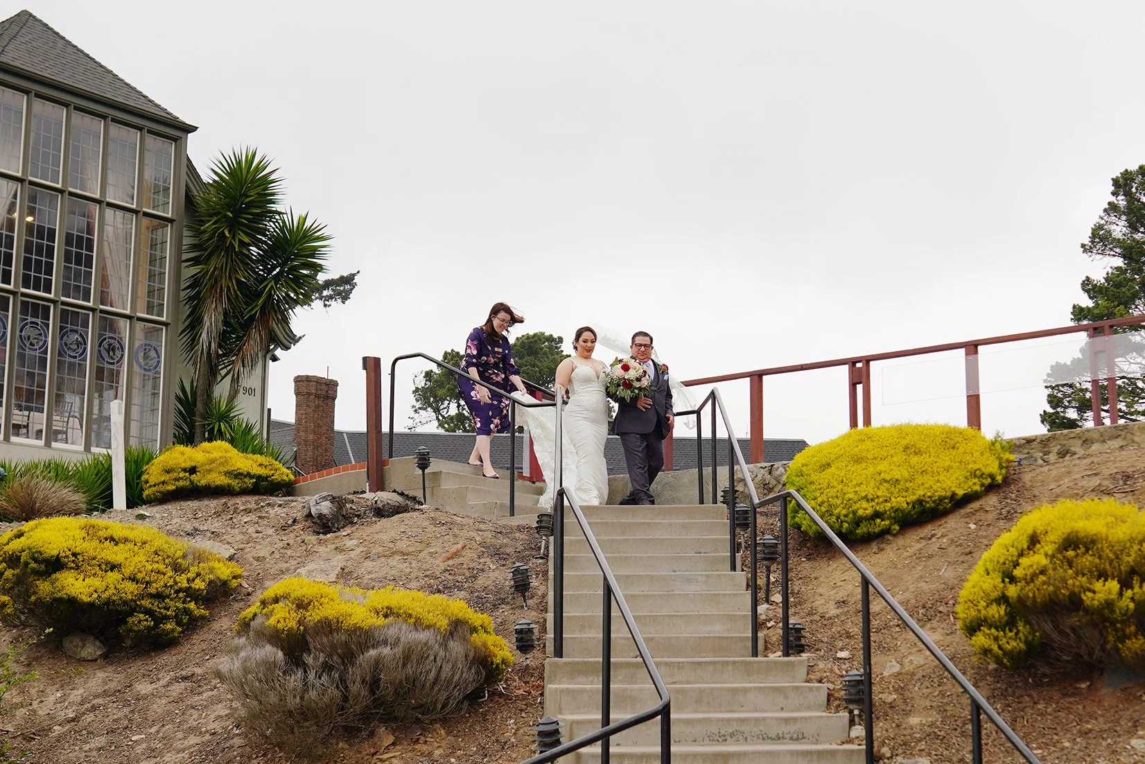 luxury-bride-walking-down-aisle-staircase-ceremony-berkeley-country-club.jpg