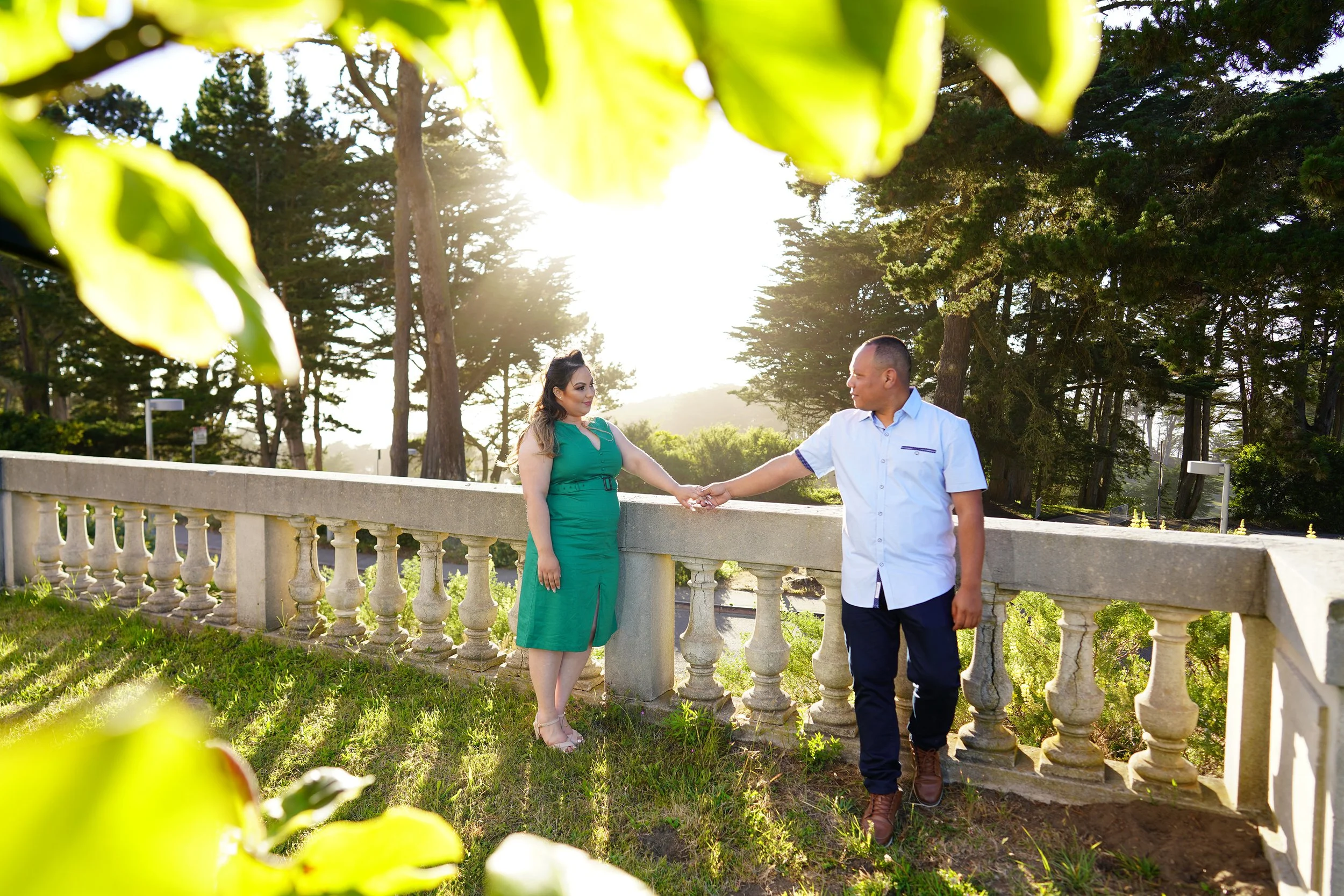 jose-and-rebecca-holding-hands-in-trees-engagement-legion-of-honor-luxury-photography.jpg