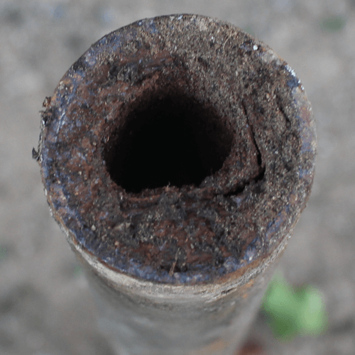 Hard Buildup in Bathtub Drain