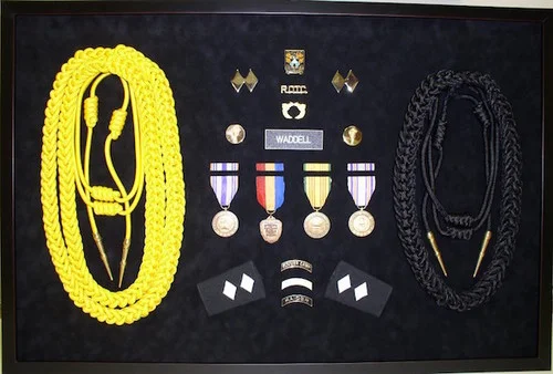 Mounting of Medals & Objects, no matter how highly dimensional, are a challenge we love to tackle. Let us shadowbox your mementos today.
