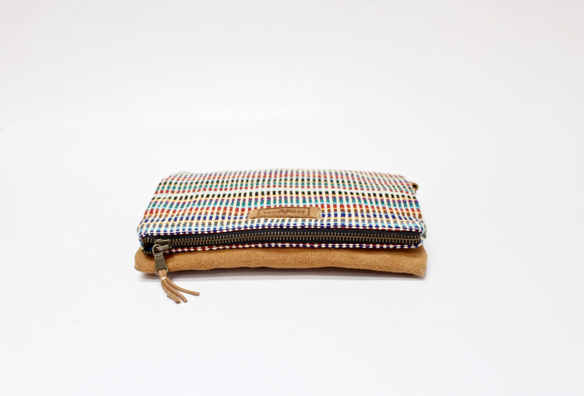 Woven fabric and leather fold over clutch ethical fashion