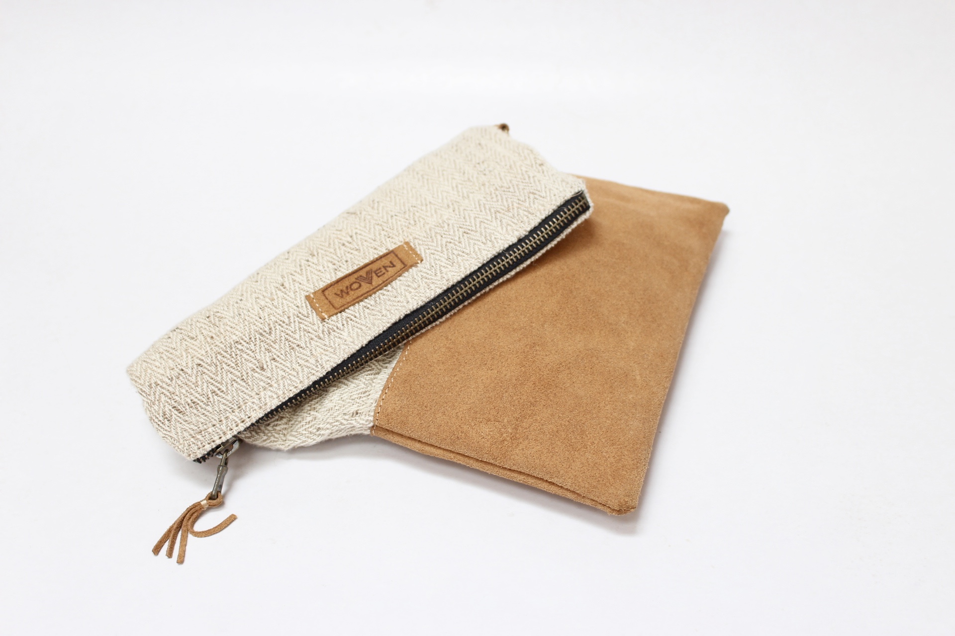 Woven fabric and leather fold over clutch ethical fashion